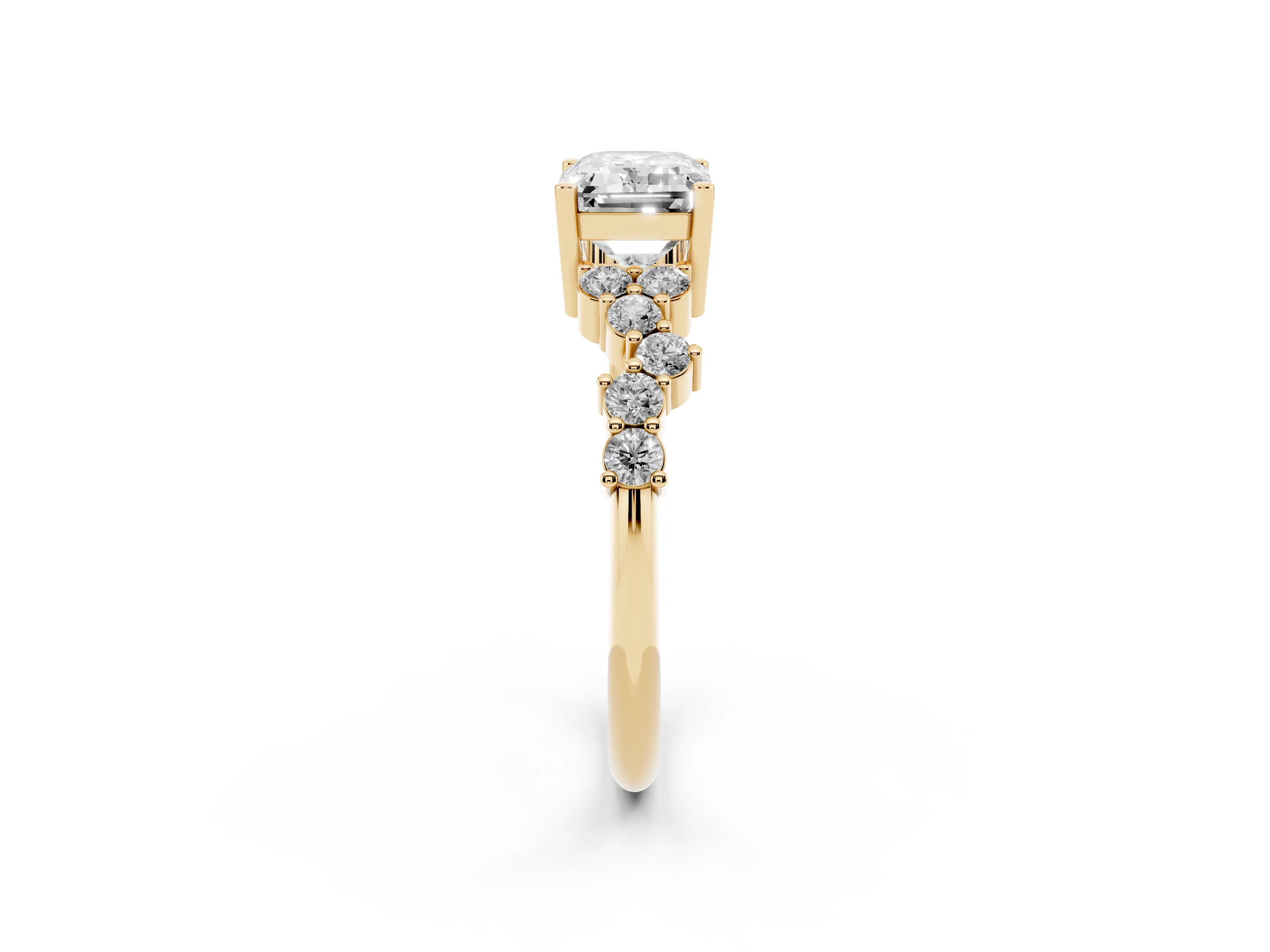 Emerald Cut Diamond Ring Set in Yellow gold with Scattered Round Accents