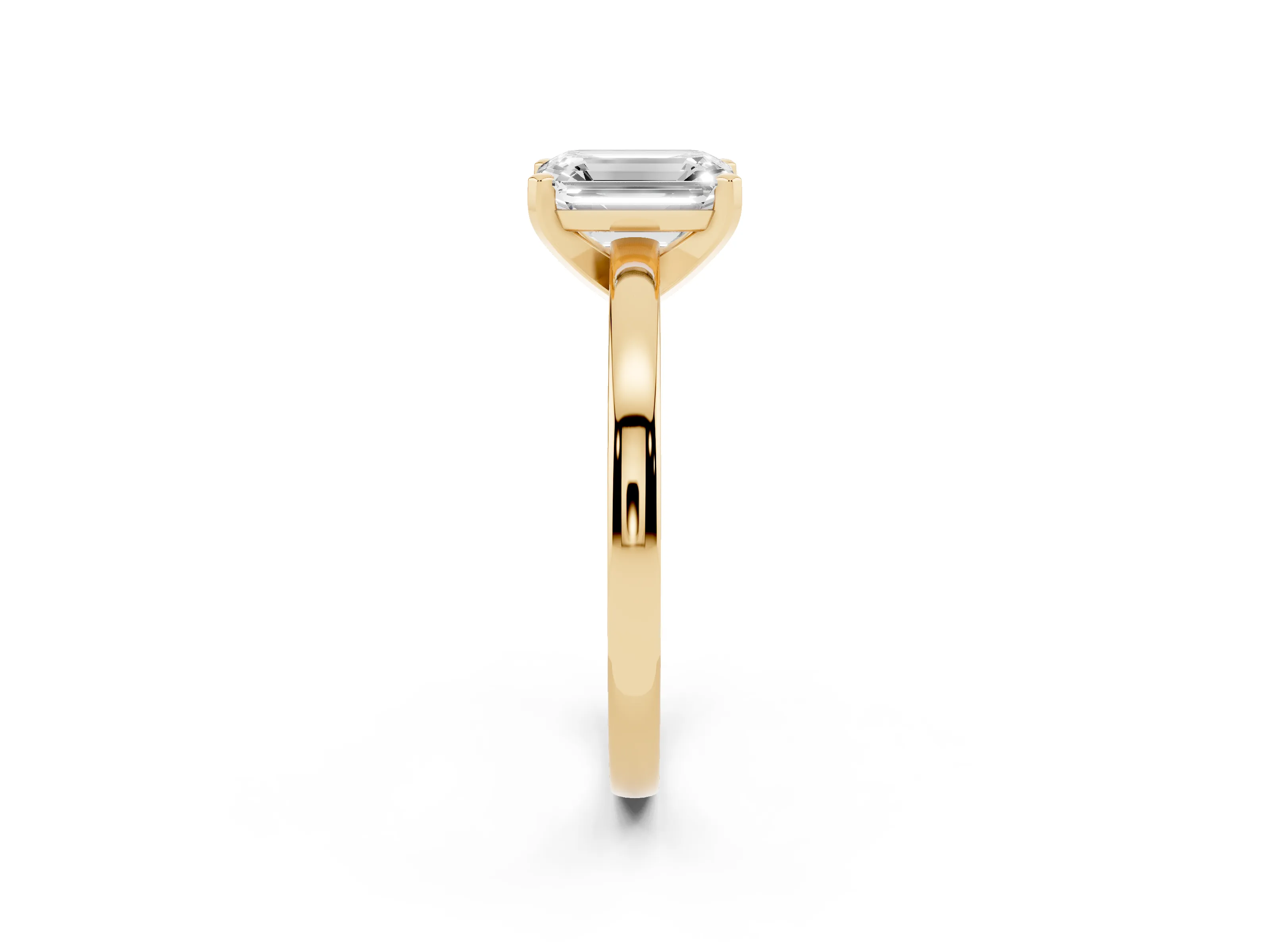 Emerald Cut Diamond Solitaire Engagement Ring Set in Yellow gold with Prong Setting on a Classic Band