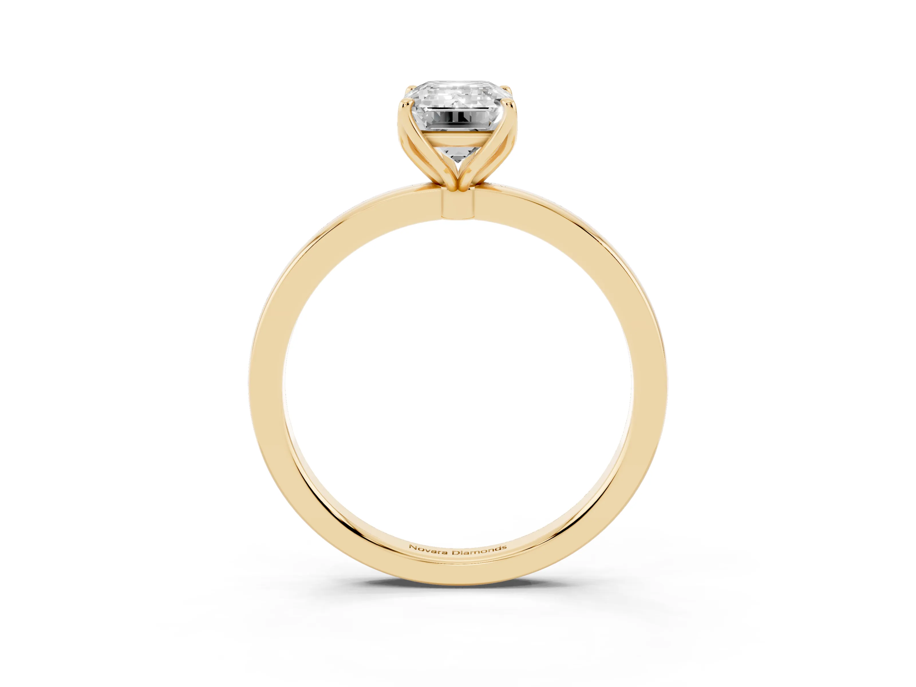 Emerald Cut Diamond Solitaire Ring Set in Yellow gold with Prong Setting and Thin Polished Band