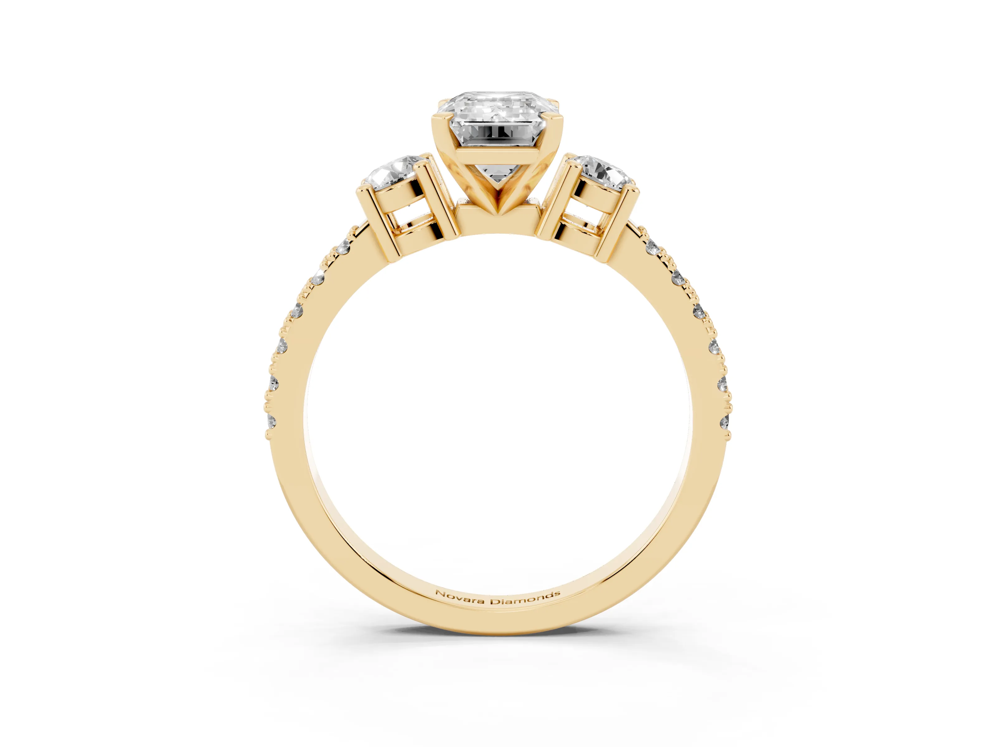 Three-Stone Emerald Cut Diamond Pavé Band Ring Set in Yellow gold with Prong Setting