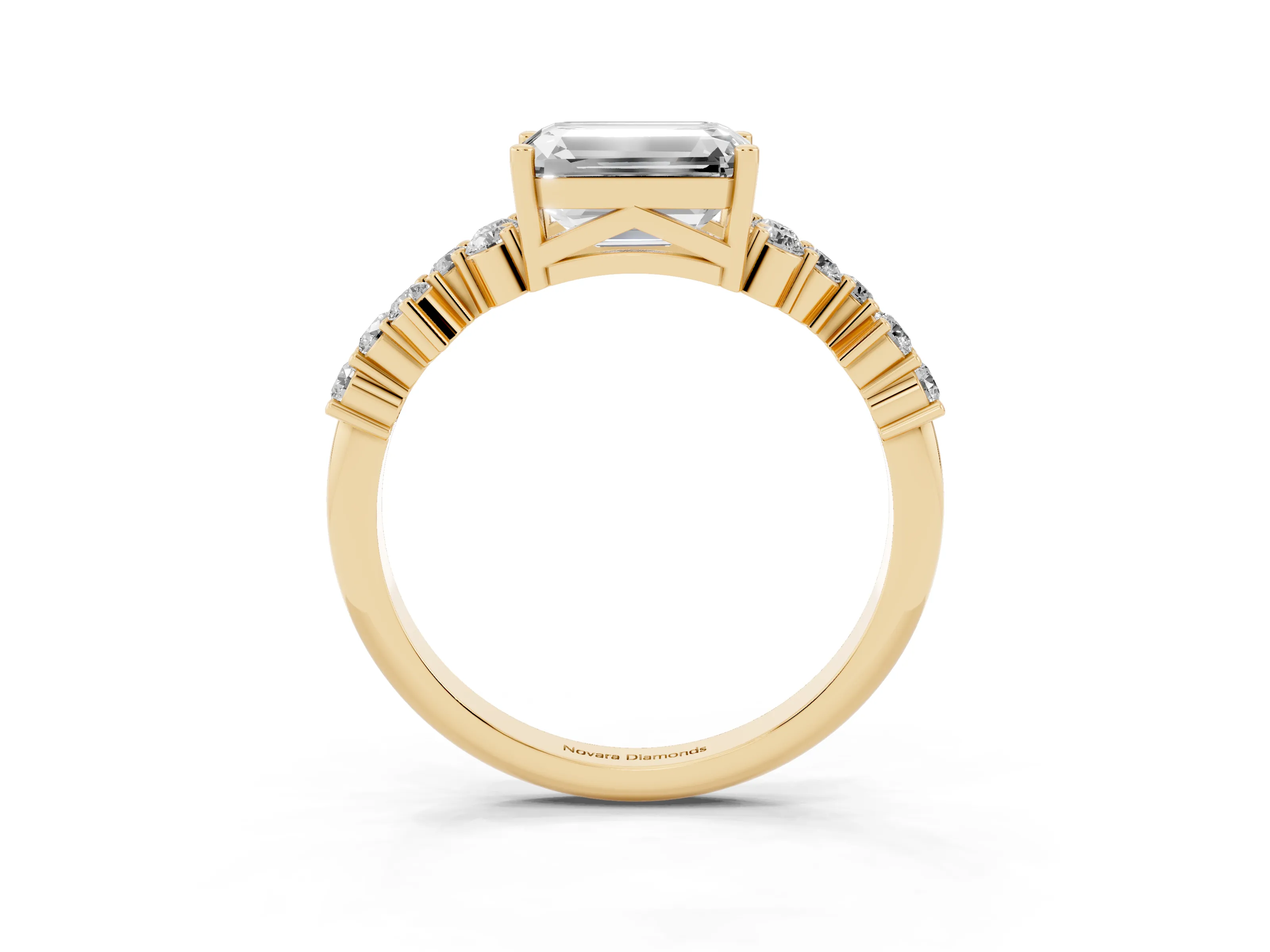 Emerald Cut Diamond Ring Set in Yellow gold with Scattered Round Accents