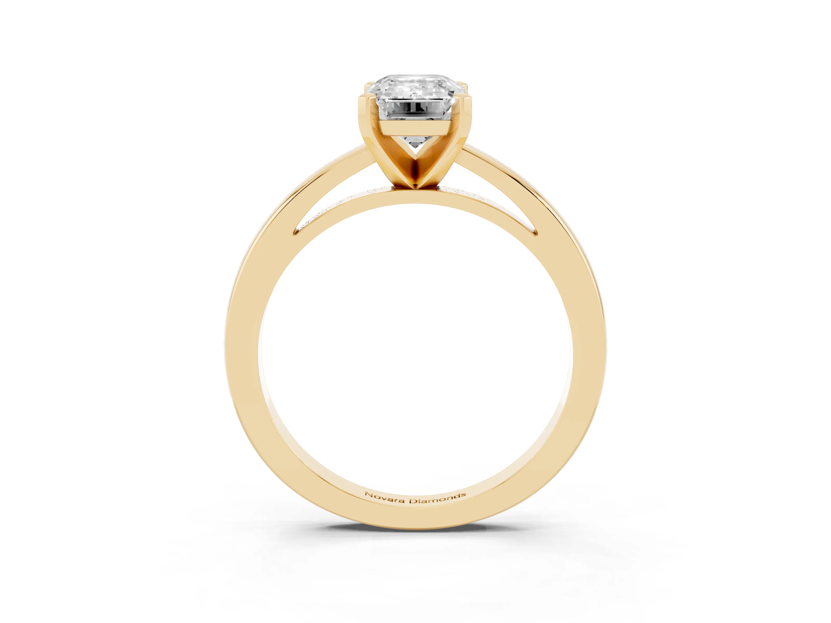 Emerald Cut Diamond Solitaire Engagement Ring Set in Yellow gold with Prong Setting on a Classic Band
