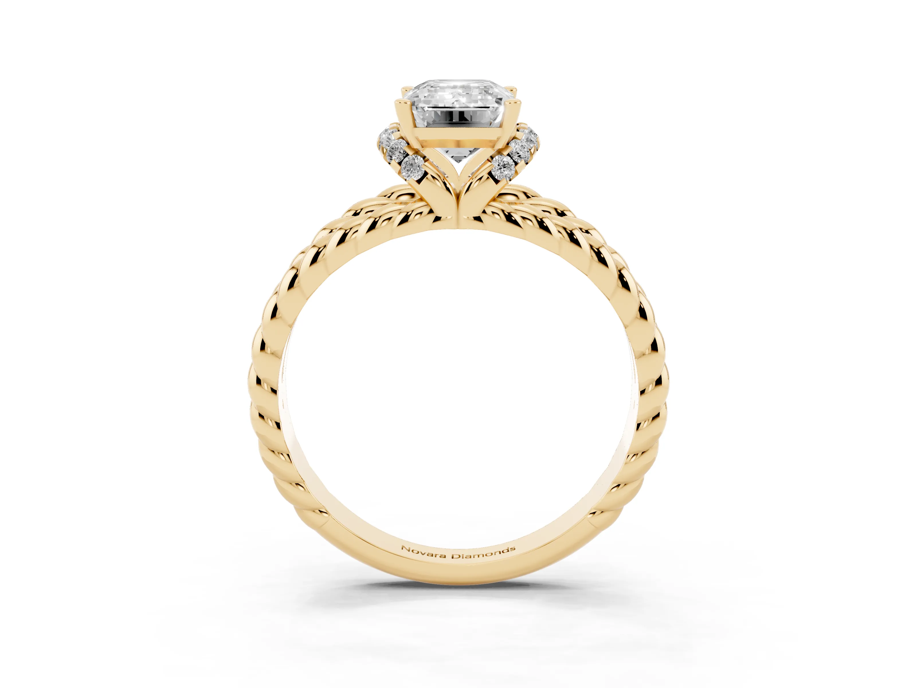 Emerald Cut Diamond Halo Ring Set in Yellow gold with Twisted Band and Prong Setting