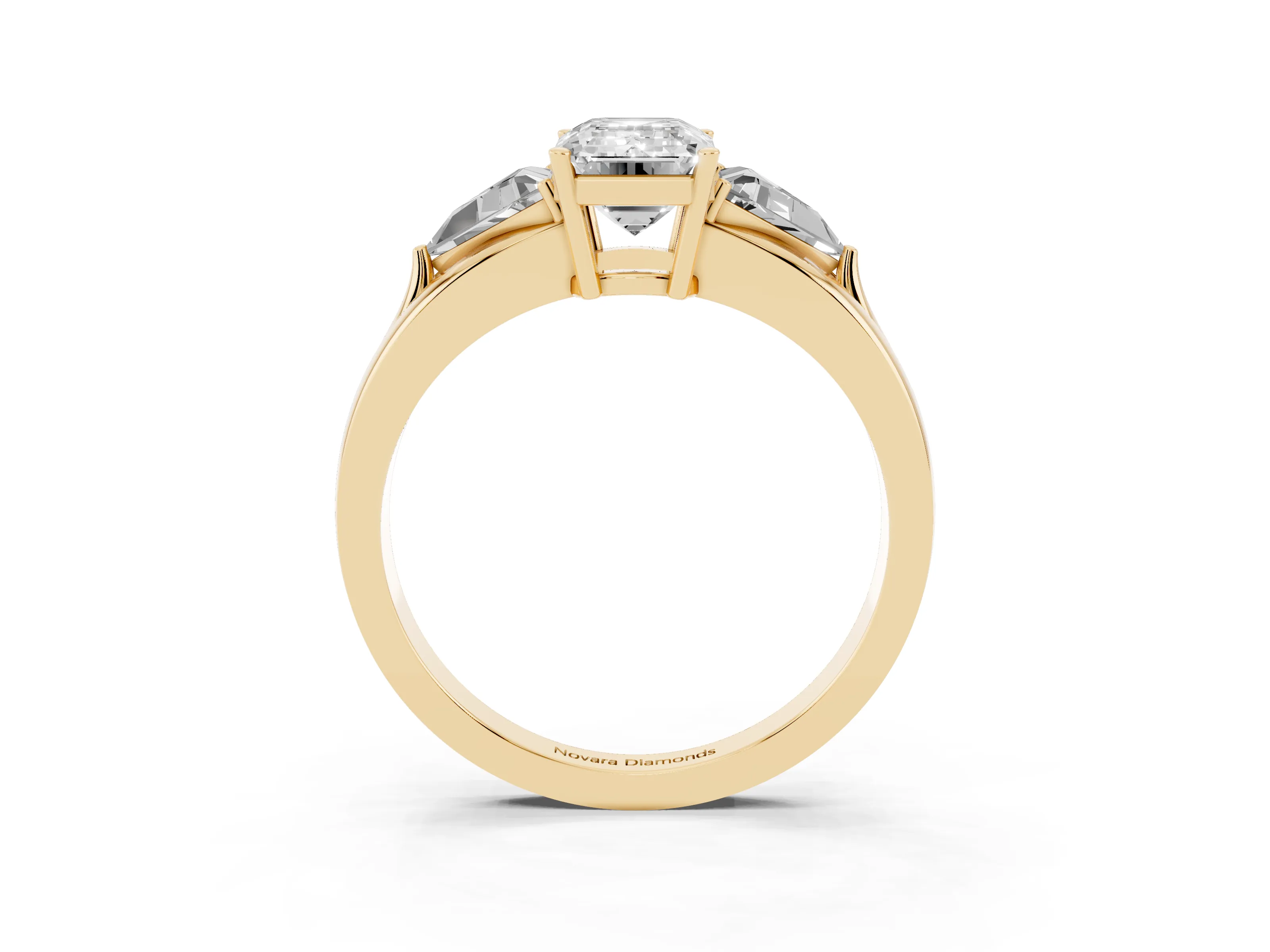 Emerald Cut Diamond Three-Stone Ring Set in Yellow gold with Trillion Side Stones and Split Shank