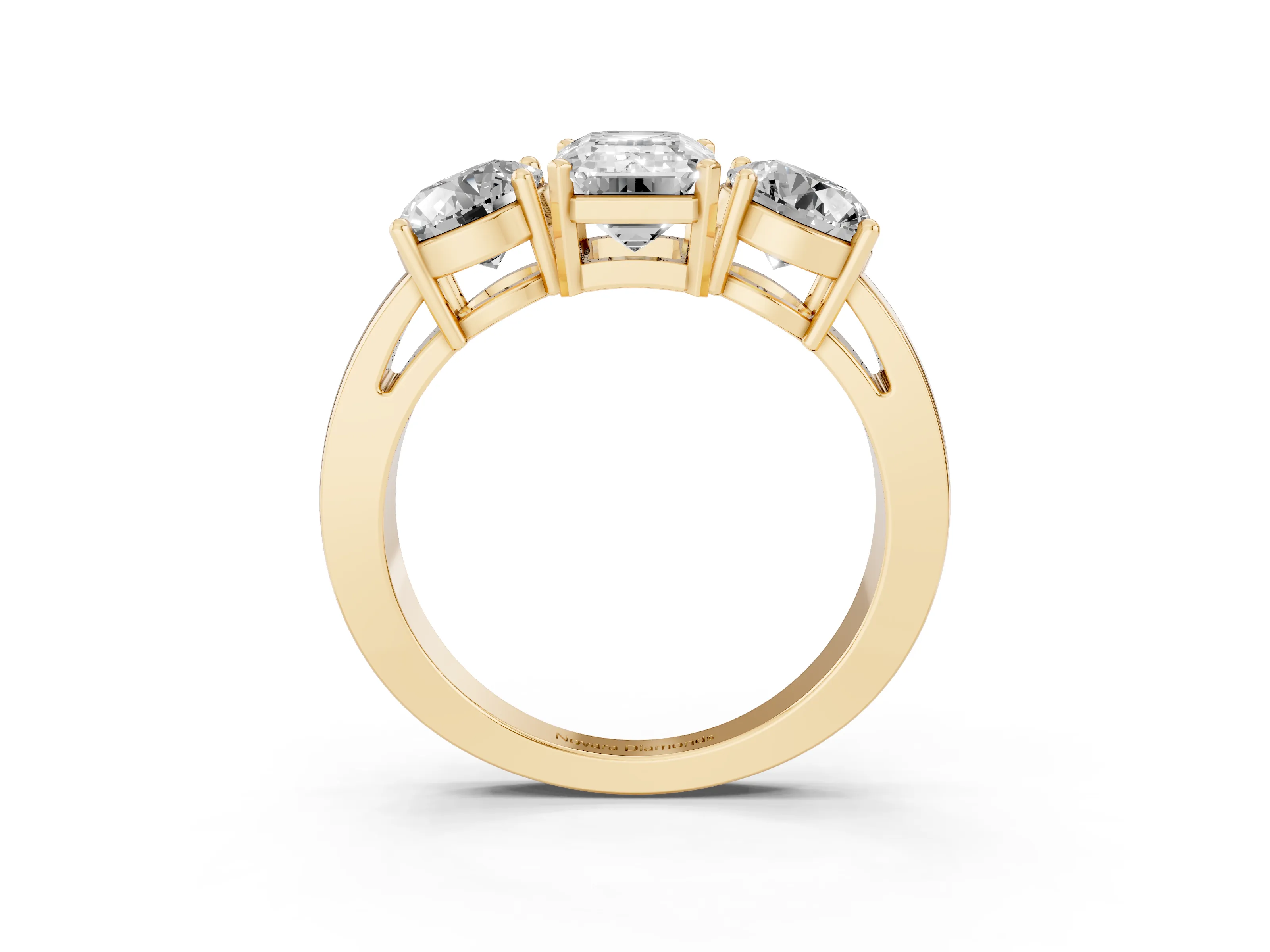 Emerald Cut Diamond Three-Stone Ring Set in Yellow gold with Round Side Stones and Classic Band