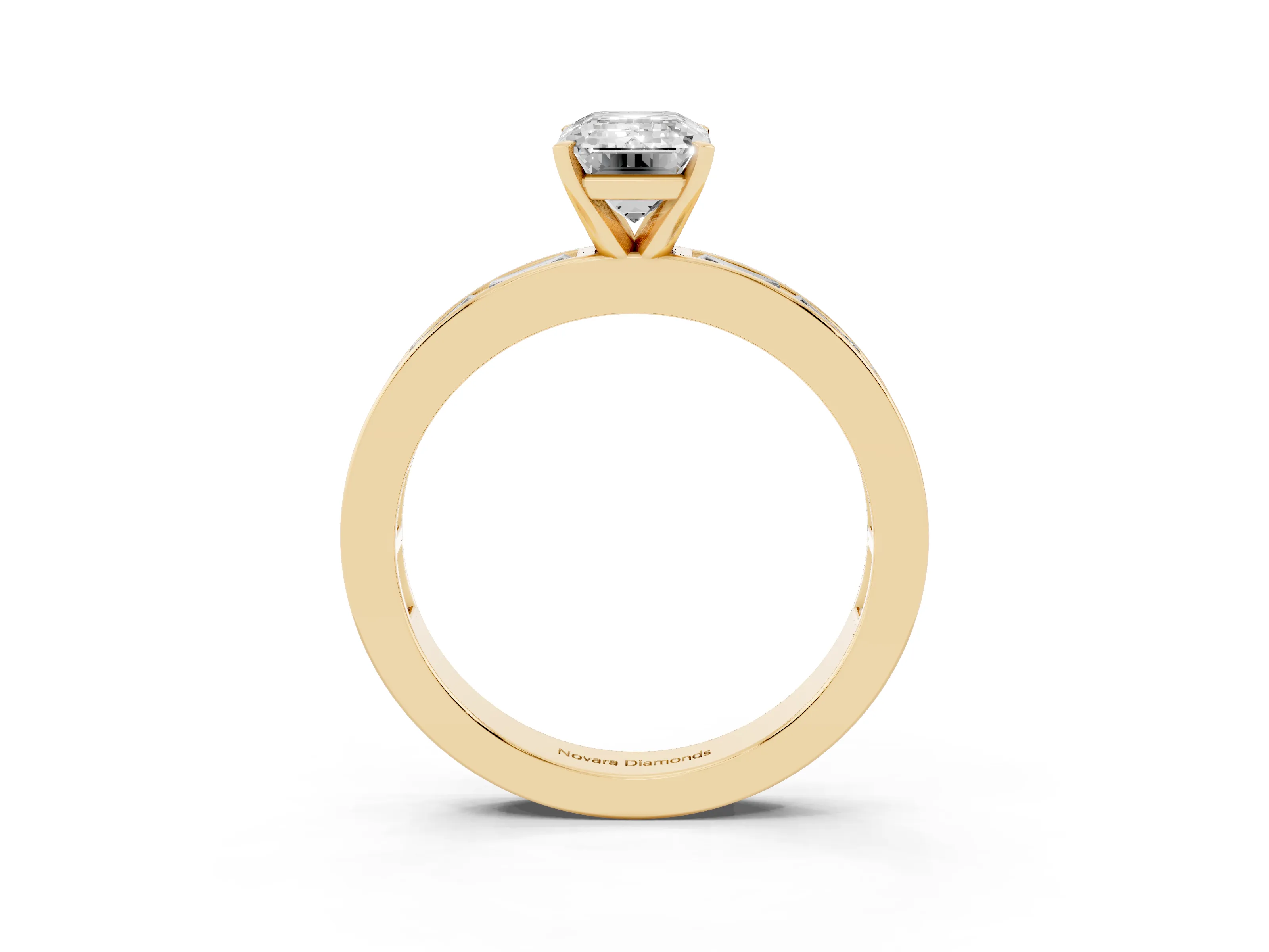 Emerald Cut Diamond Solitaire Ring Set in Yellow gold with Channel-Set Baguette Band and Prong Setting