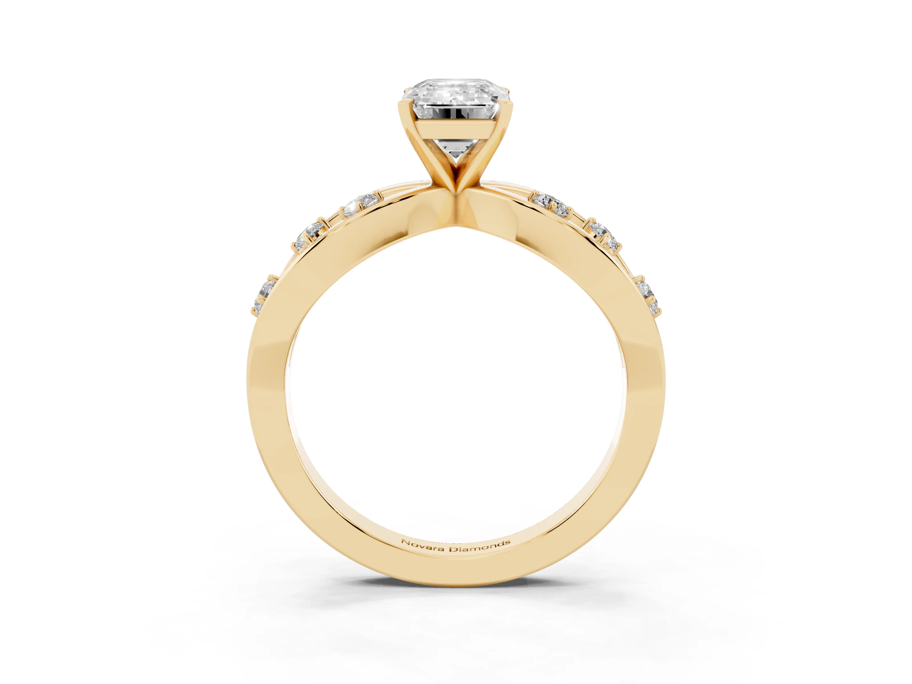 Emerald Cut Diamond Solitaire Ring Set in Yellow gold with Side Stones on Criss-Cross Band and Prong Setting