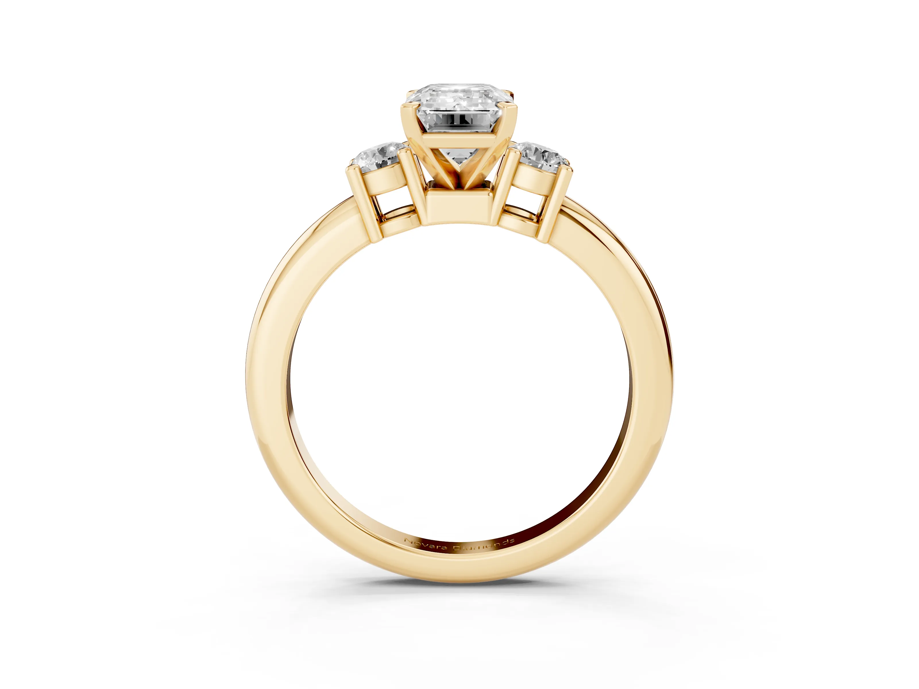 Three-Stone Emerald Cut Diamond Ring Set in Yellow gold with Prong Setting and Plain Band