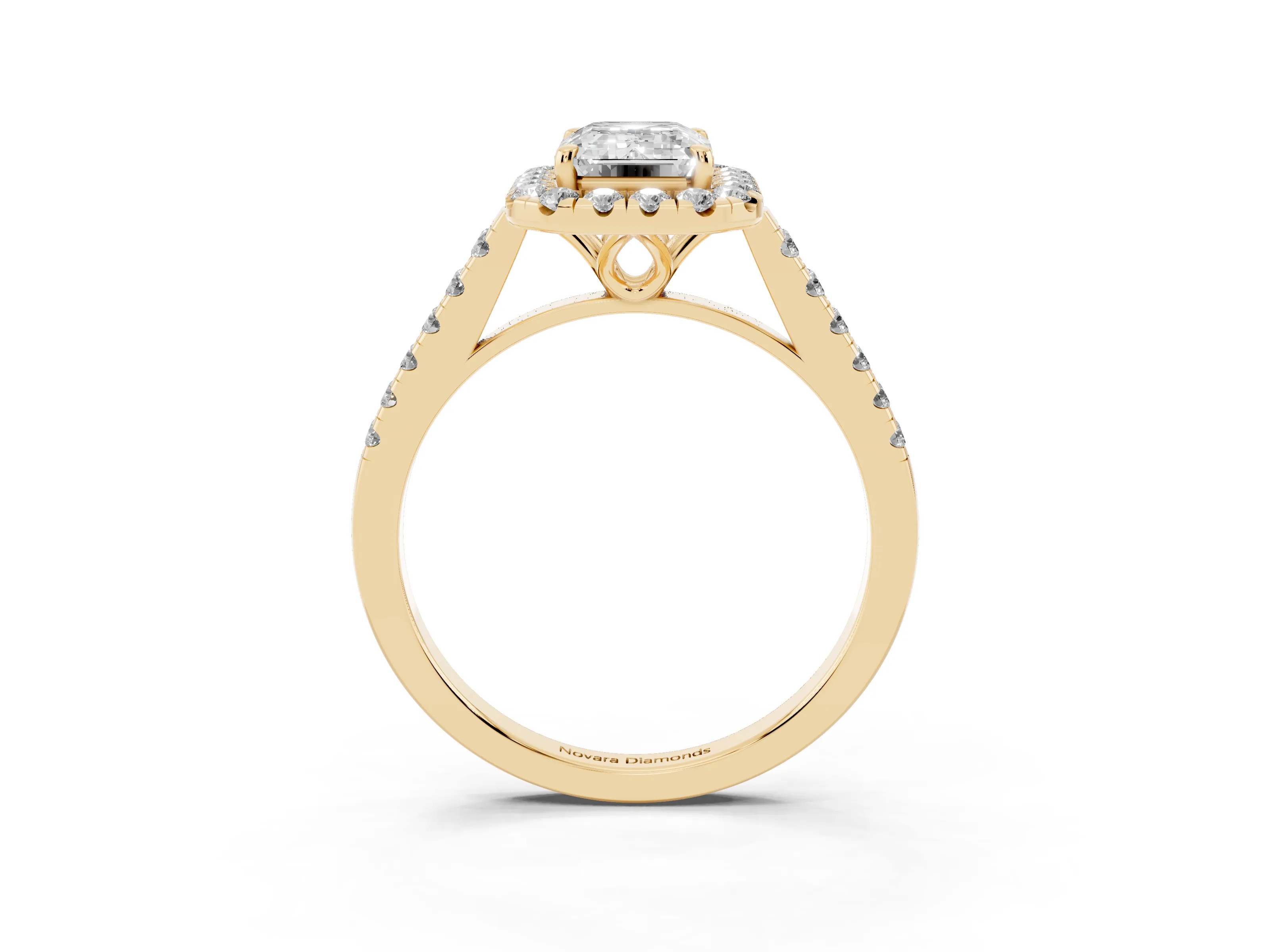 Emerald Cut Diamond Pavé Halo Engagement Ring Set in Yellow gold with Pavé Band and Prong Setting