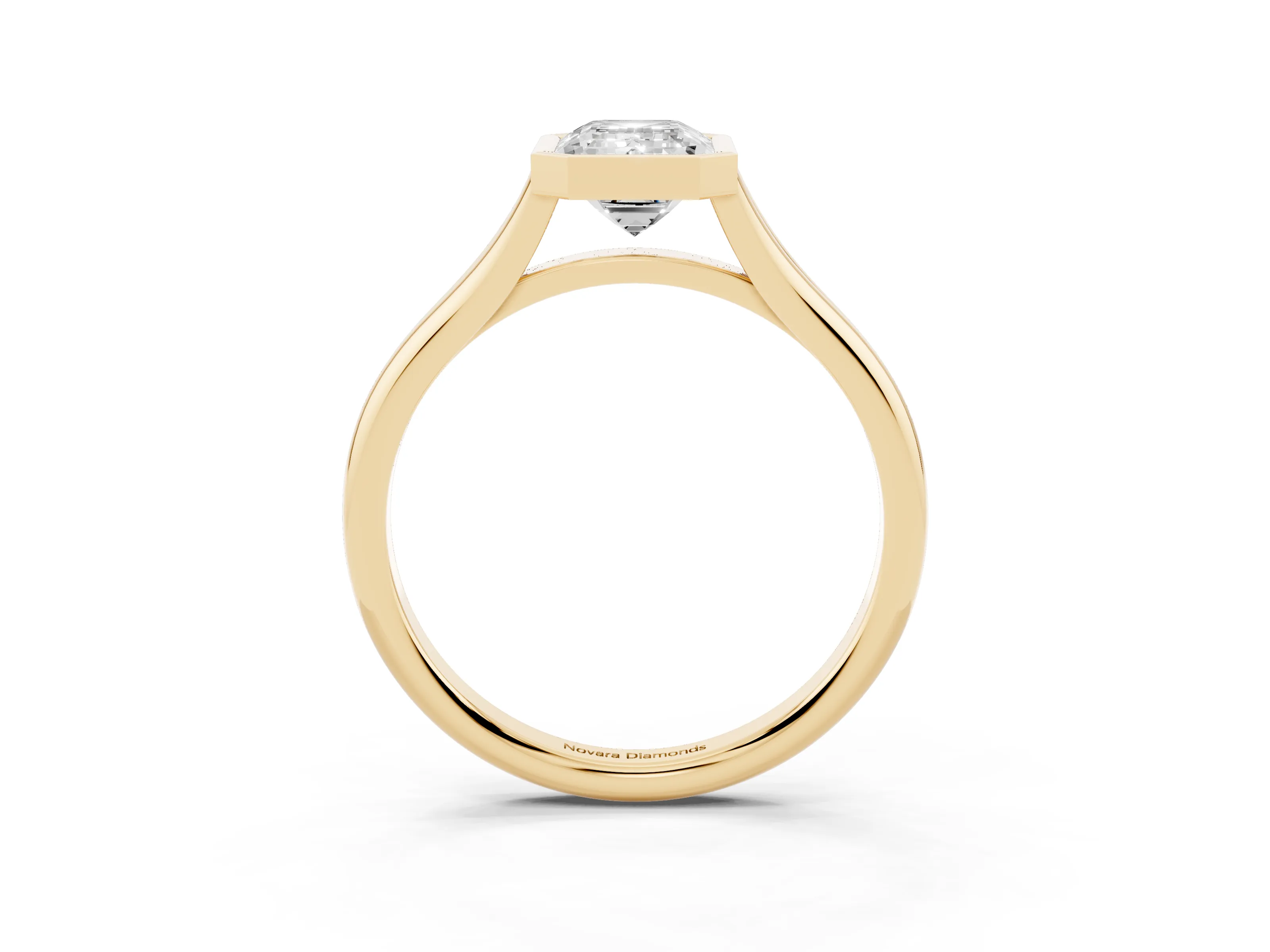Bezel Set Emerald Cut Diamond Solitaire Ring Set in Yellow gold with Tapered Band