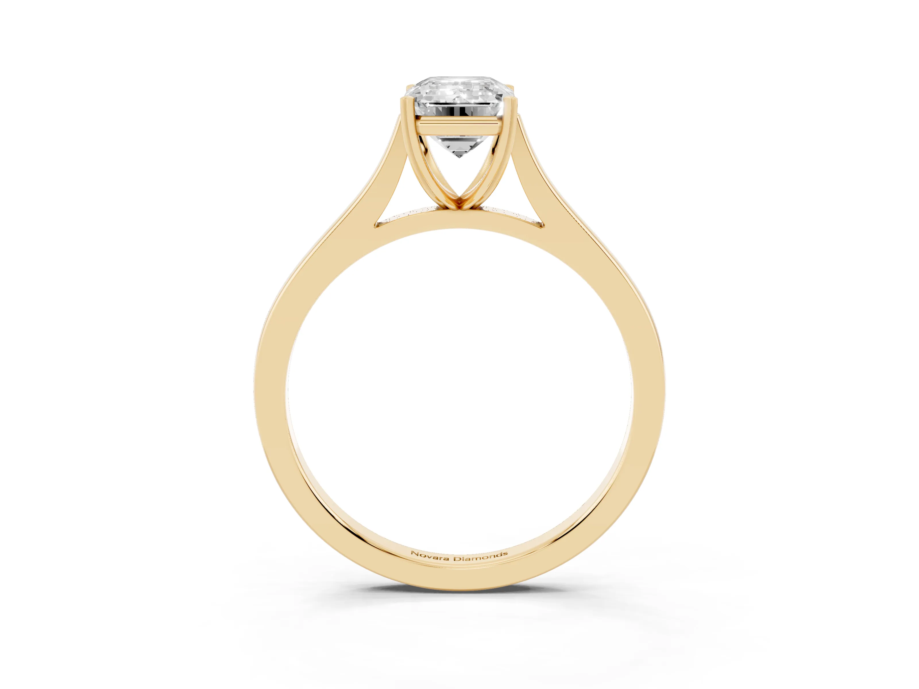 Emerald Cut Diamond Solitaire Heart Prong Engagement Ring Set in Yellow gold with Tapered Band