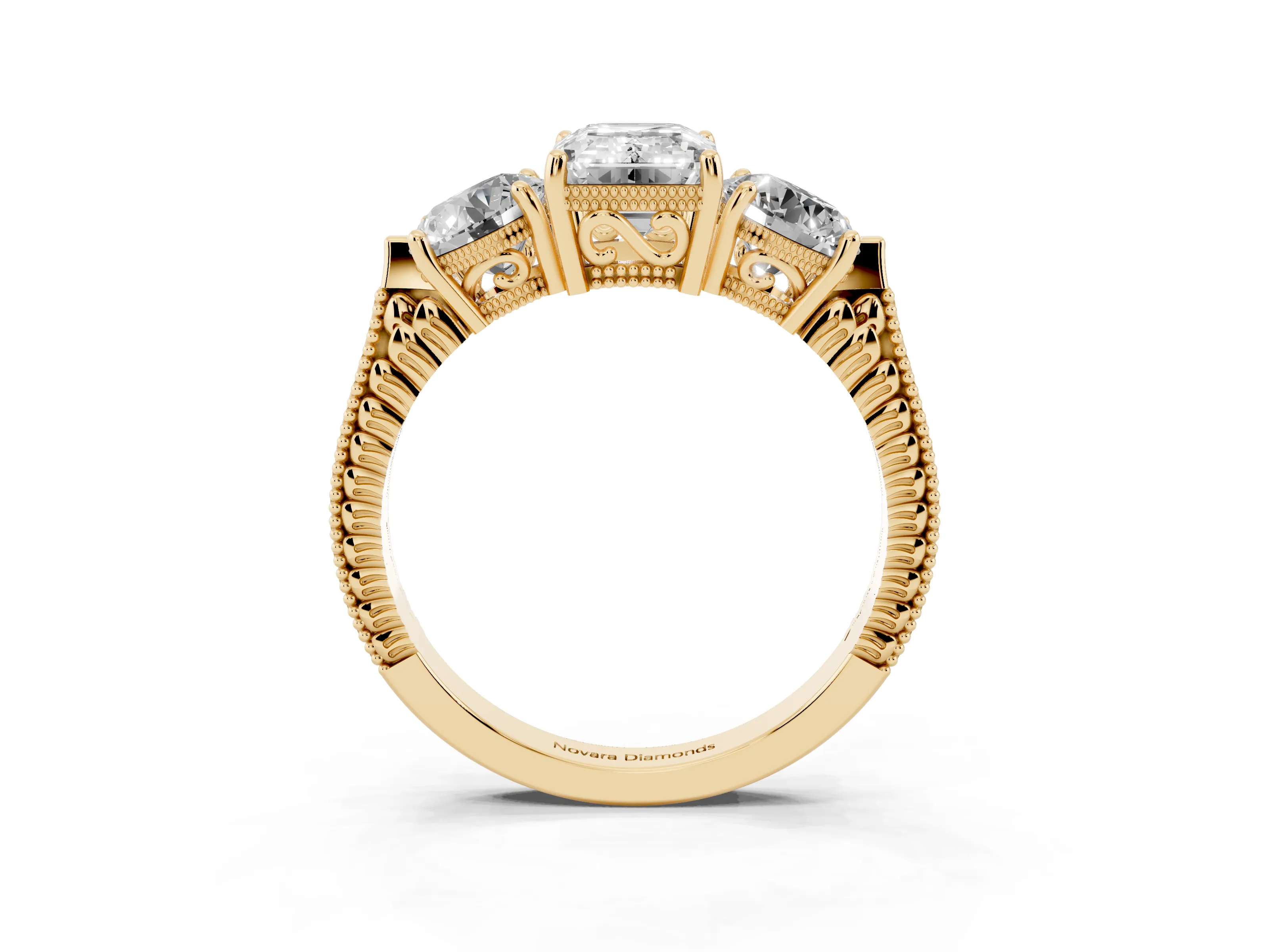 Emerald Cut Diamond Three-Stone Ring Set in Yellow gold with Milgrain Band