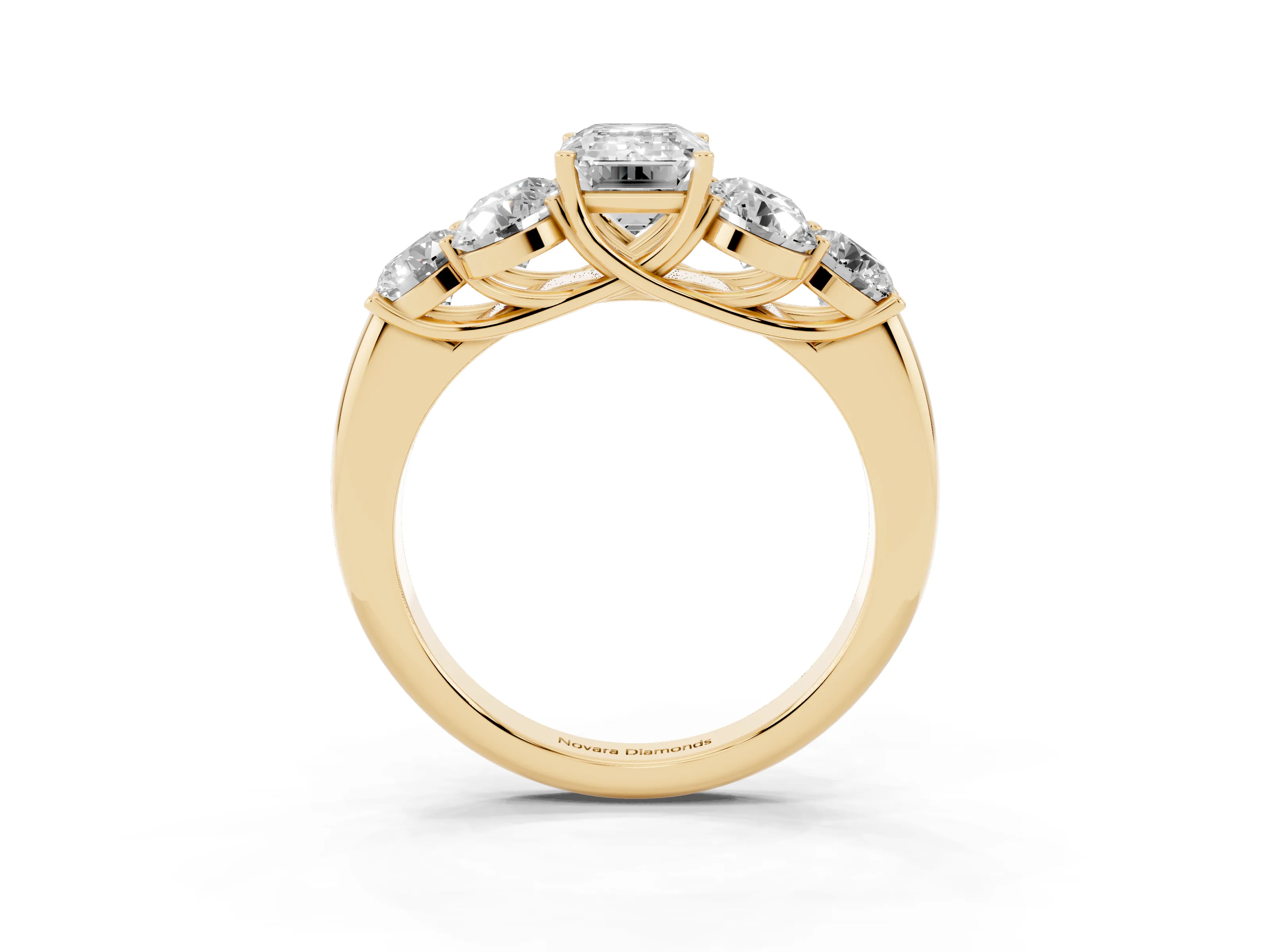 Emerald Cut Diamond Cluster Ring Set in Yellow gold with Round Accent Stones and Prong Setting on a Plain Band