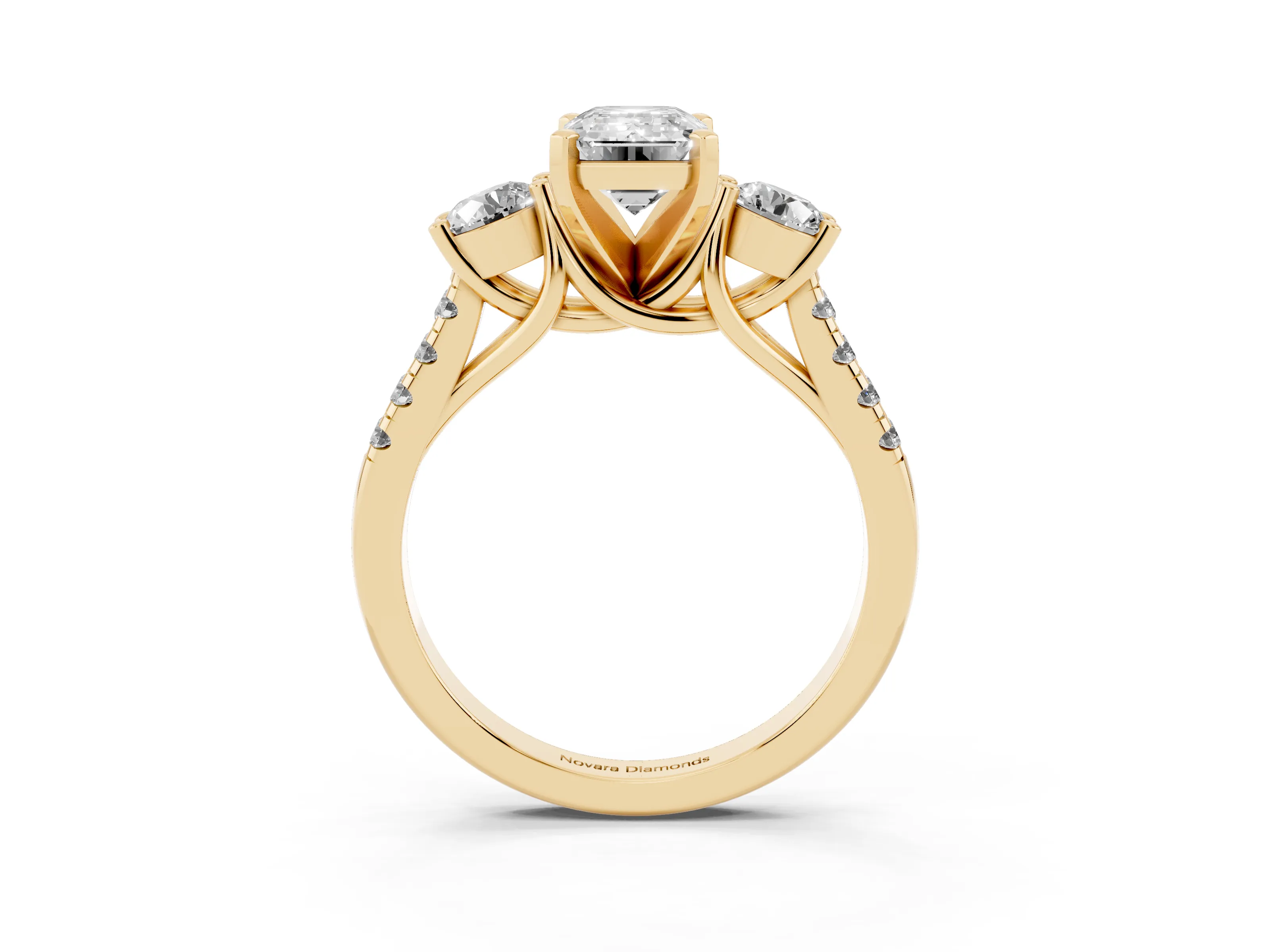 Three-Stone Emerald Cut Diamond Pavé Band Ring Set in Yellow gold with Prong-Set Trio