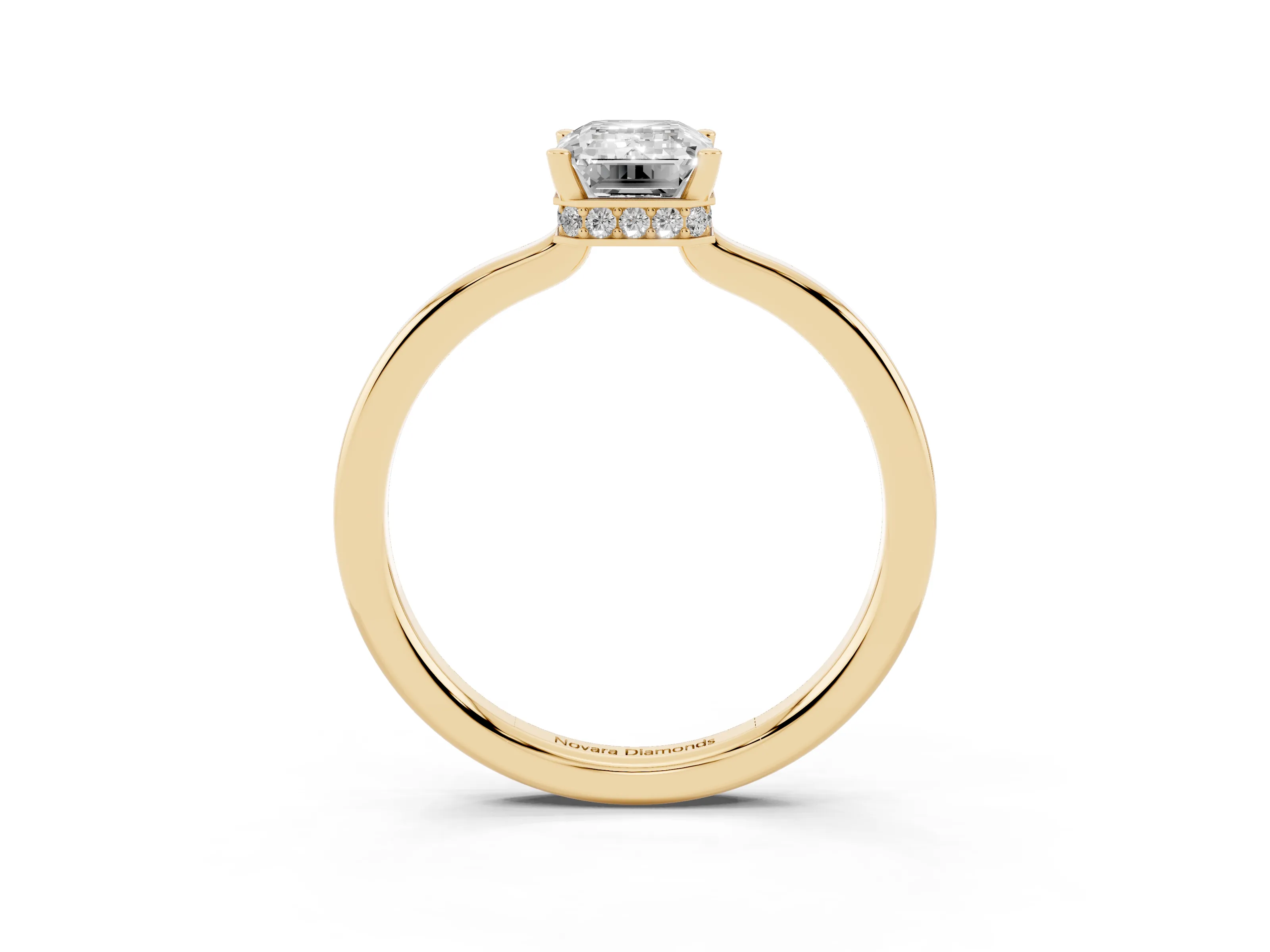 Emerald Cut Diamond Solitaire Engagement Ring Set in Yellow gold with Prong Setting on a Plain Band