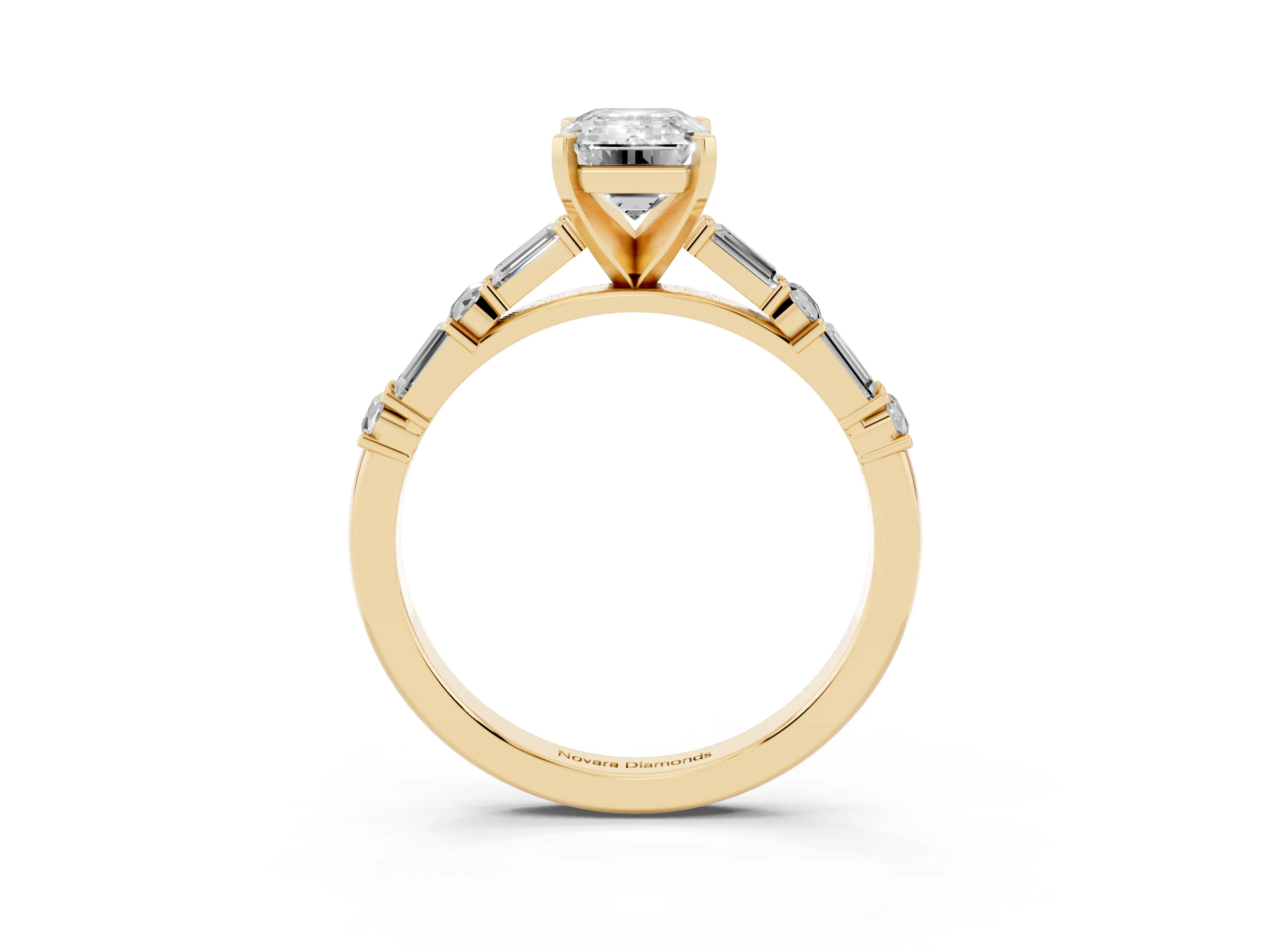 Emerald Cut Diamond Solitaire Set in Yellow gold with Side Baguettes and Channel Set Band
