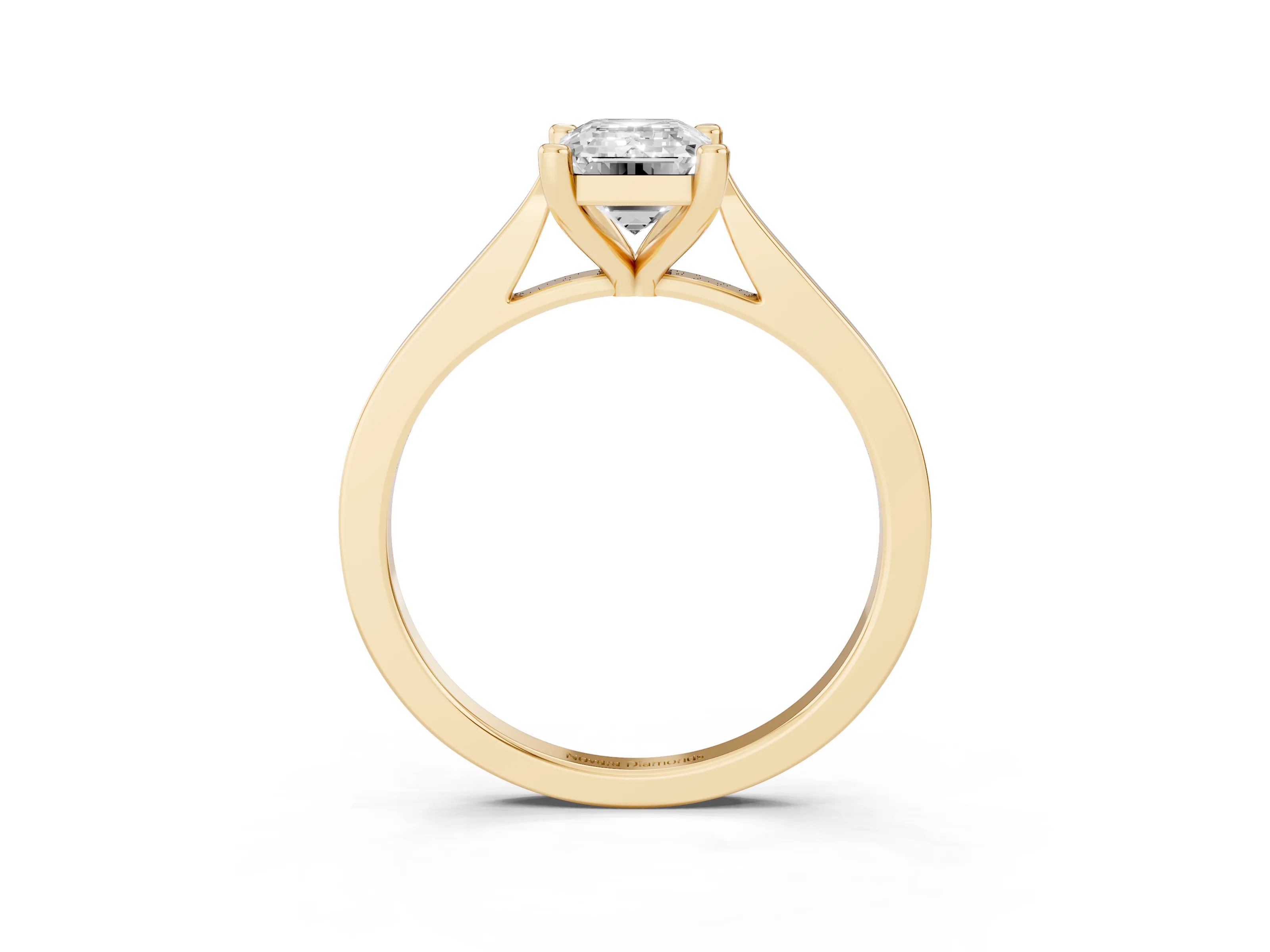 Emerald Cut Diamond Solitaire Ring Set in Yellow gold with Prong Setting and Tapered Band