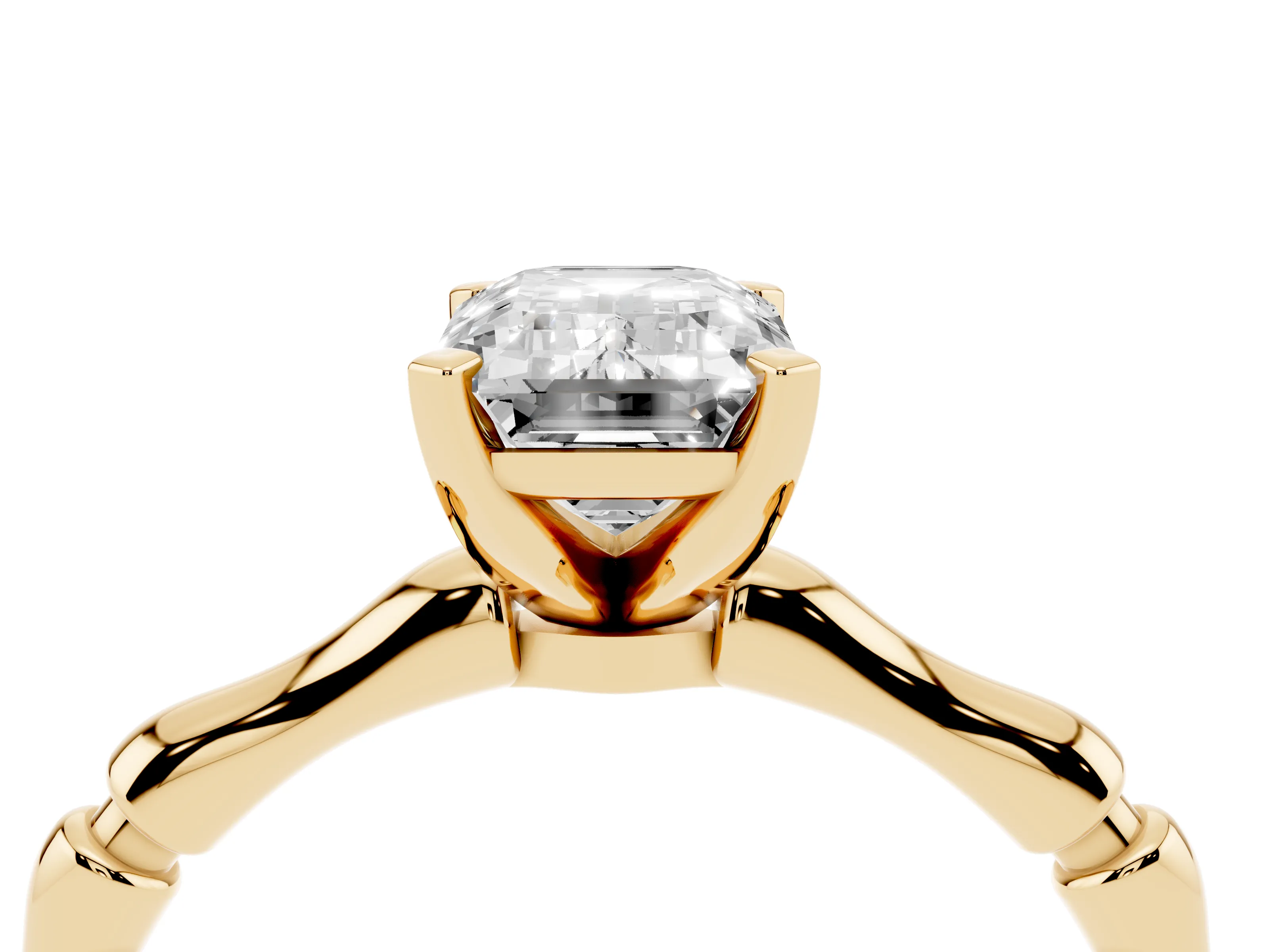 Emerald Cut Diamond Solitaire Ring Set in Yellow gold with Bamboo Band and Prong Setting