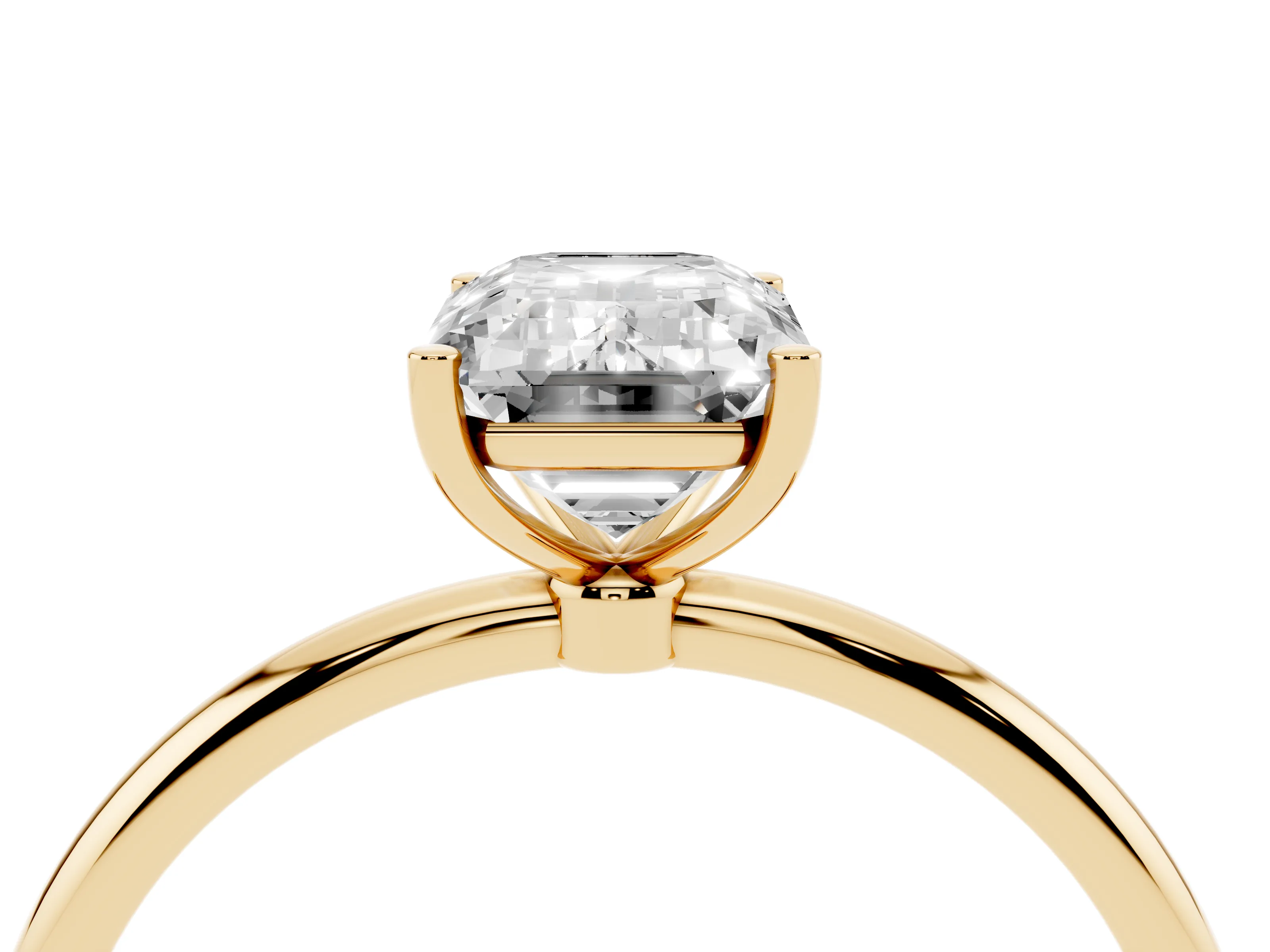 Emerald Cut Diamond Solitaire Engagement Ring Set in Yellow gold with Thin Band and Prong Setting