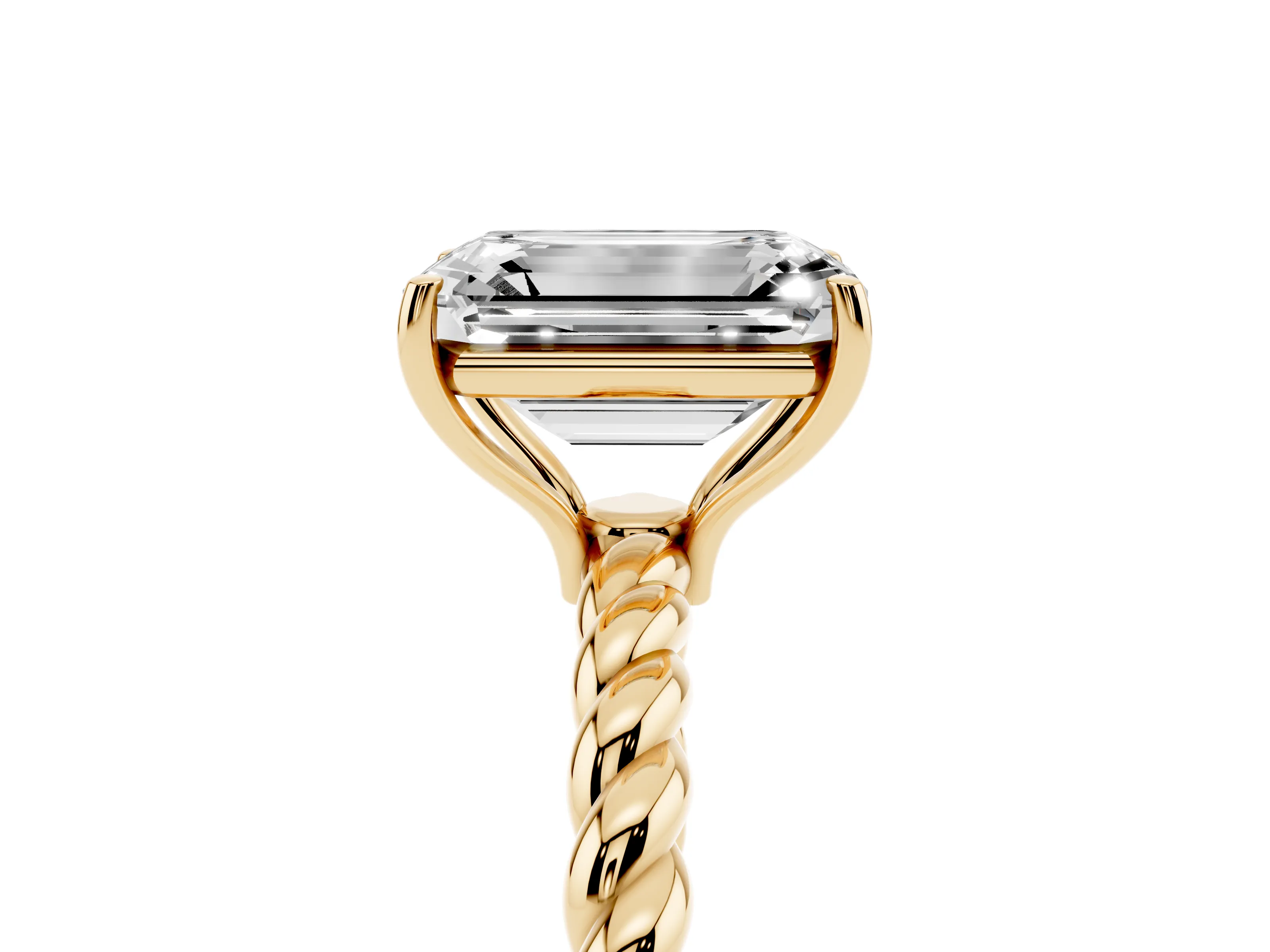 Emerald Cut Diamond Solitaire Ring Set in Yellow gold with Twist Band and Prong Setting