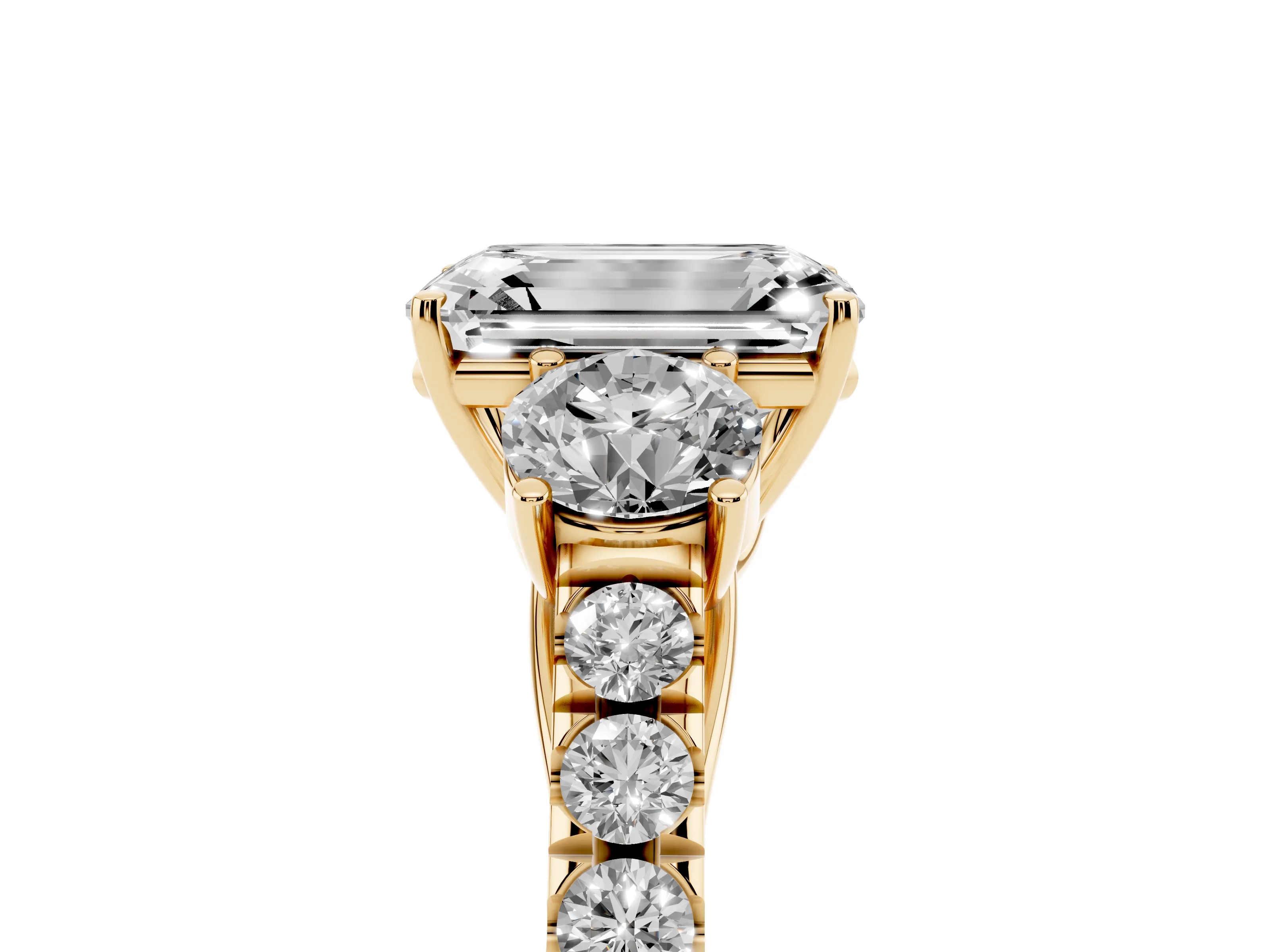 Emerald Cut Diamond Three-Stone Ring Set in Yellow gold with Round Side Stones and Delicate Pavé Band