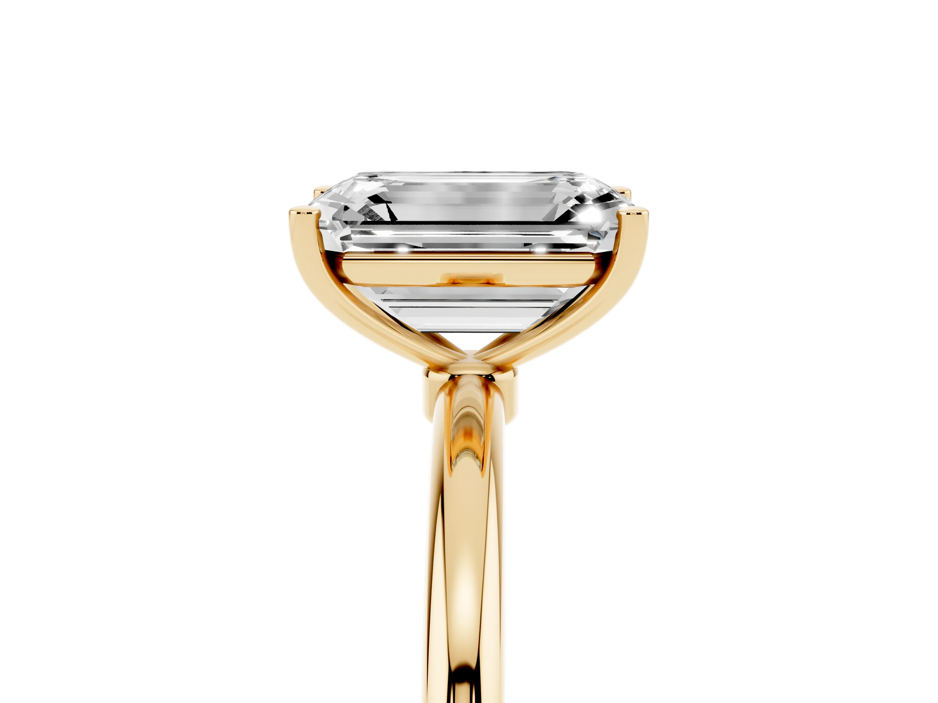 Emerald Cut Diamond Solitaire Engagement Ring Set in Yellow gold with Thin Band and Prong Setting