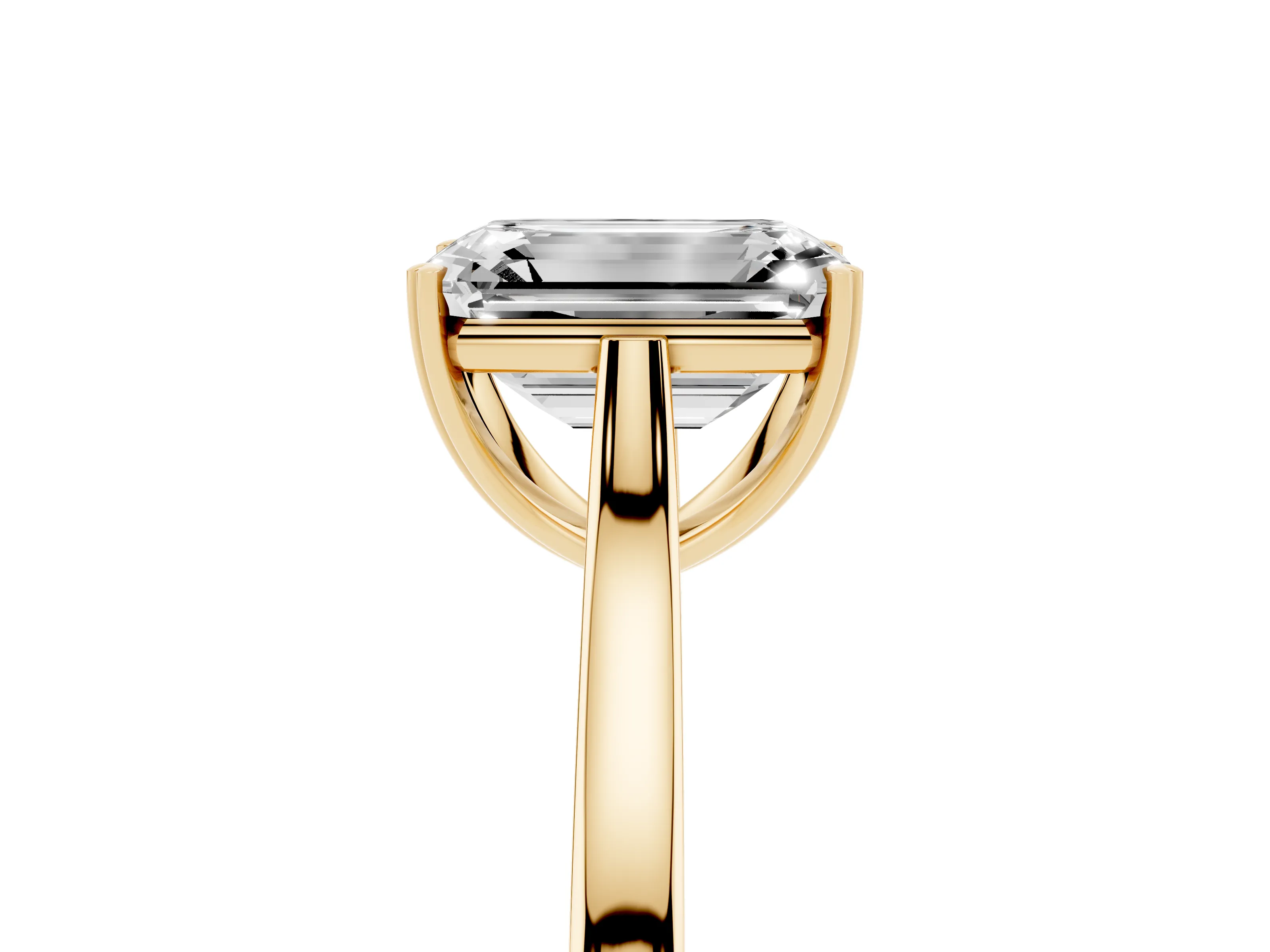 Emerald Cut Diamond Solitaire Heart Prong Engagement Ring Set in Yellow gold with Tapered Band