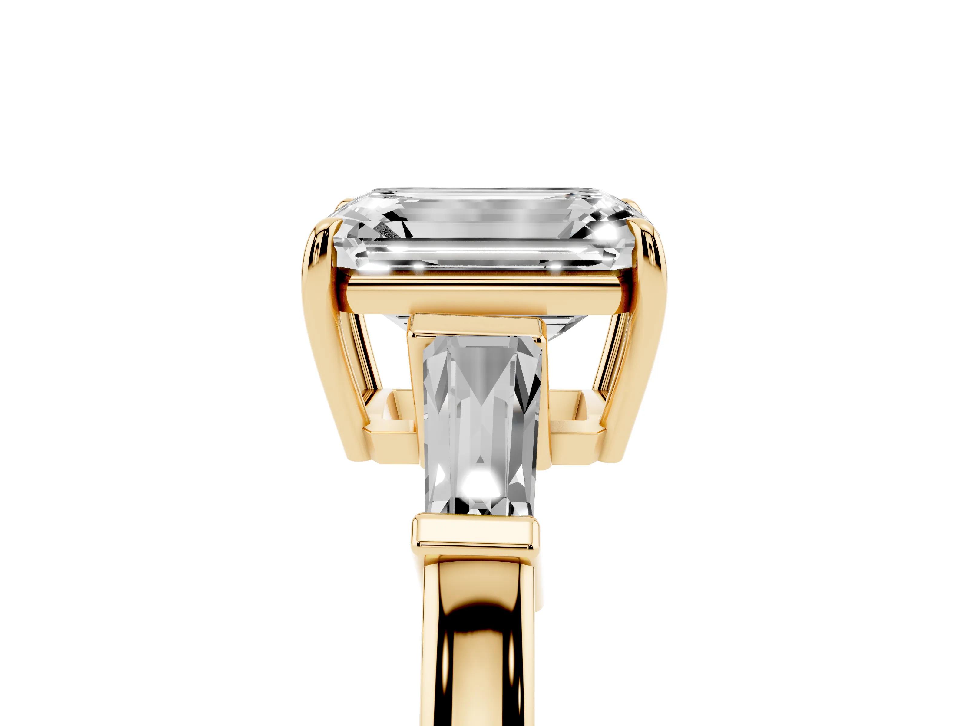 Emerald Cut Diamond Three-Stone Ring Set in Yellow gold with Tapered Baguette Side Stones and Prong Setting
