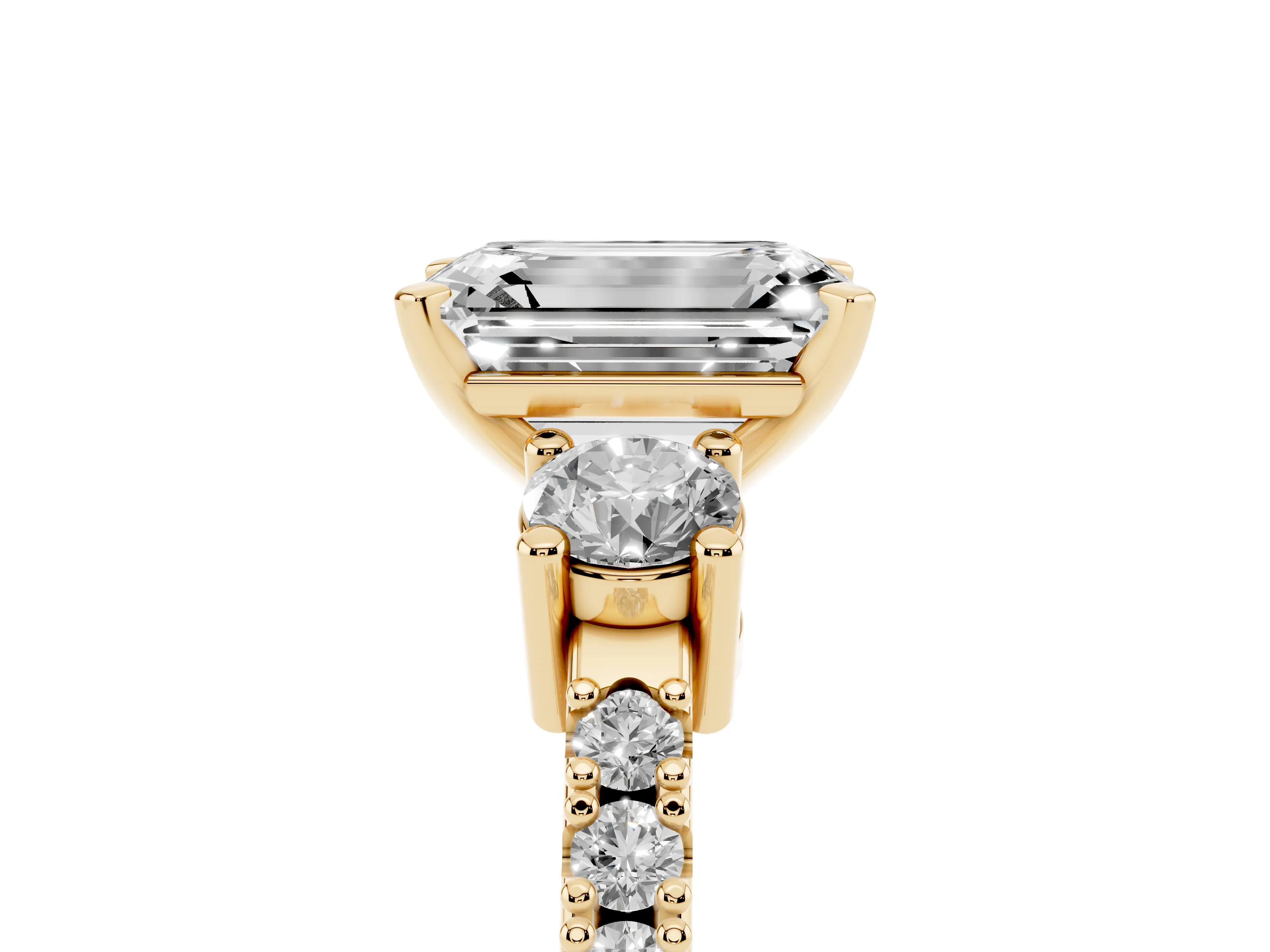 Three-Stone Emerald Cut Diamond Pavé Band Ring Set in Yellow gold with Prong Setting