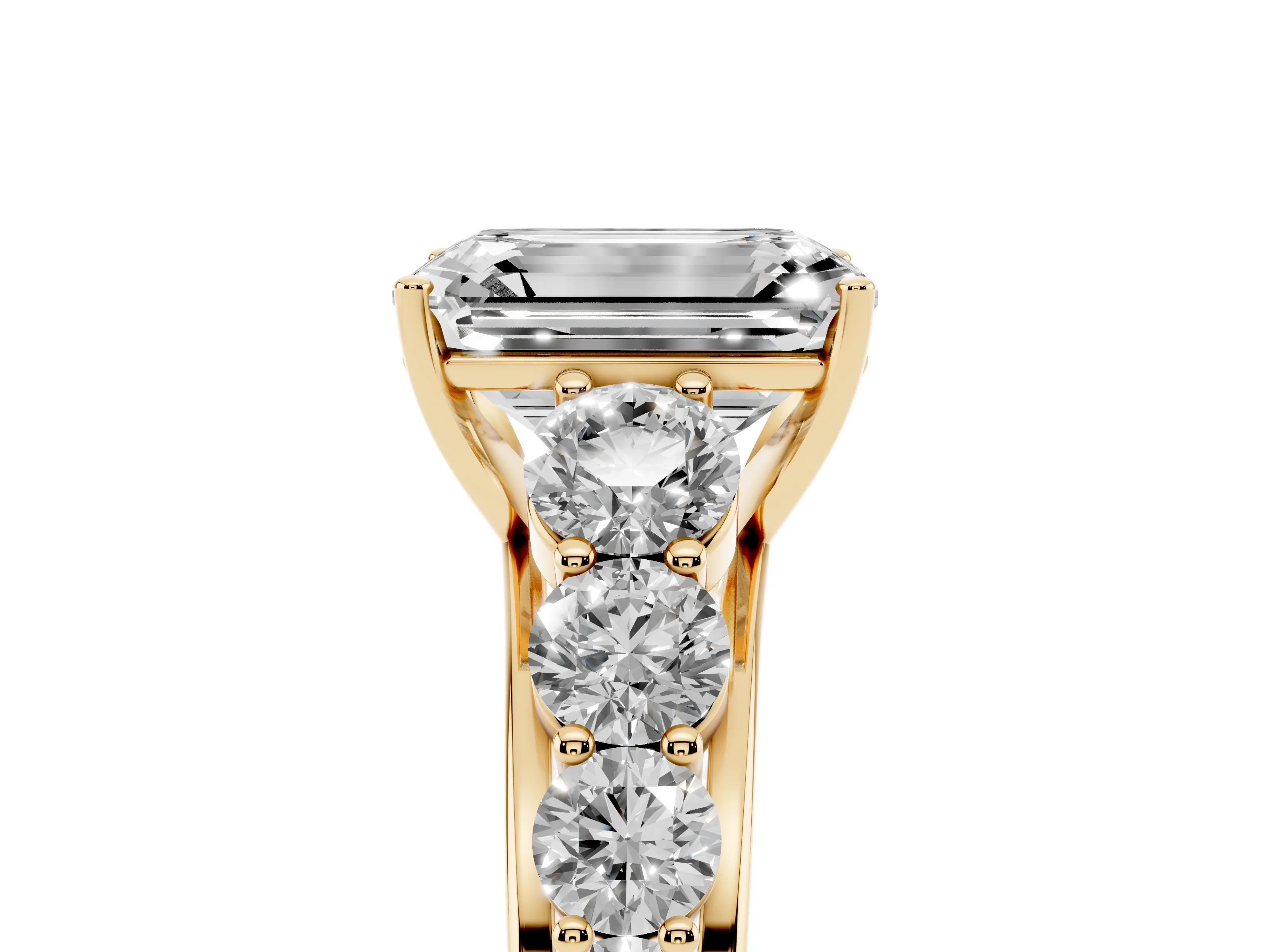 Emerald Cut Diamond Solitaire Ring Set in Yellow gold with Pavé-Set Band and Prong Setting