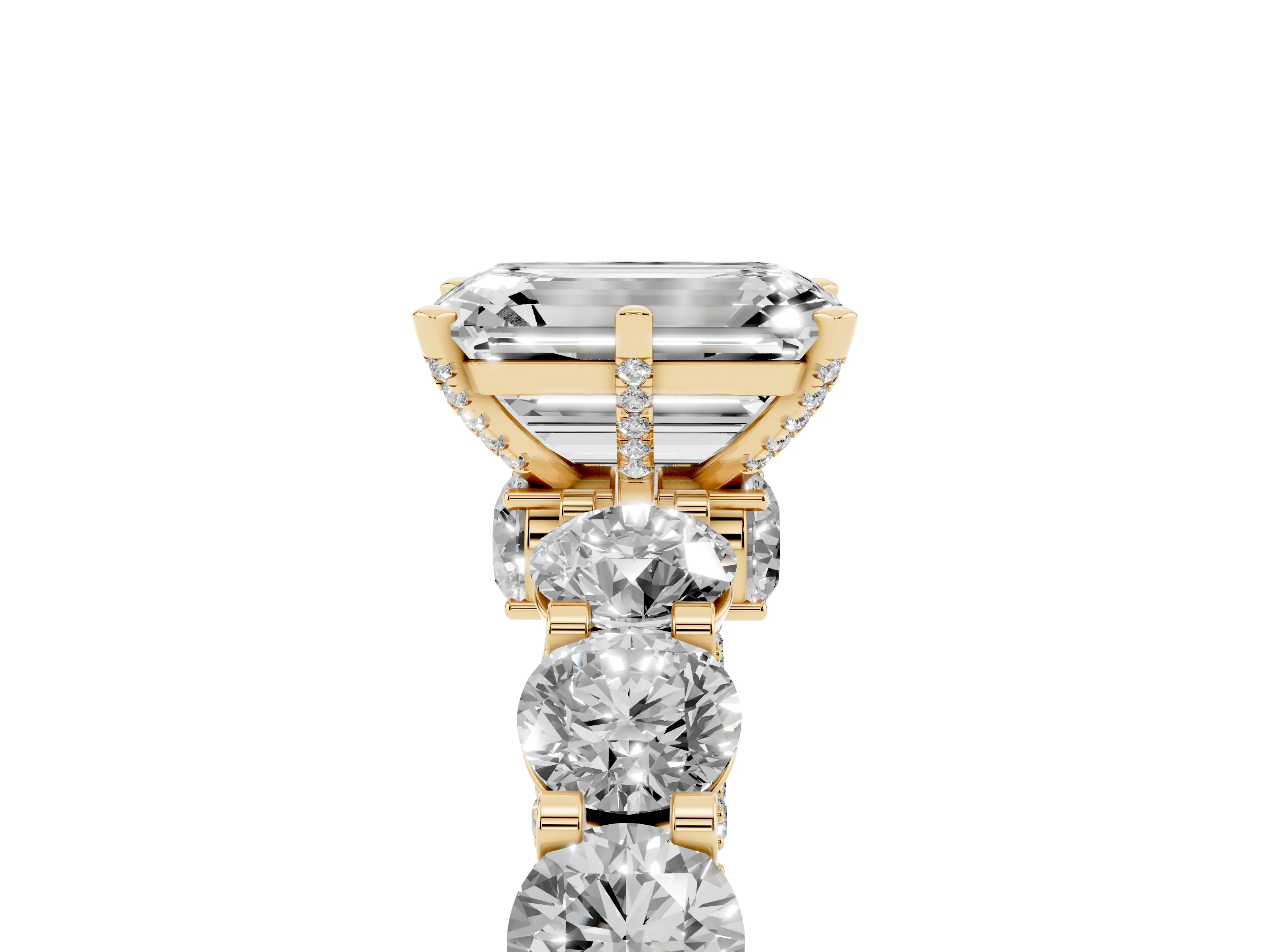 Emerald Cut Diamond Side Stone Ring Set in Yellow gold with Alternating Round and Oval Side Stones