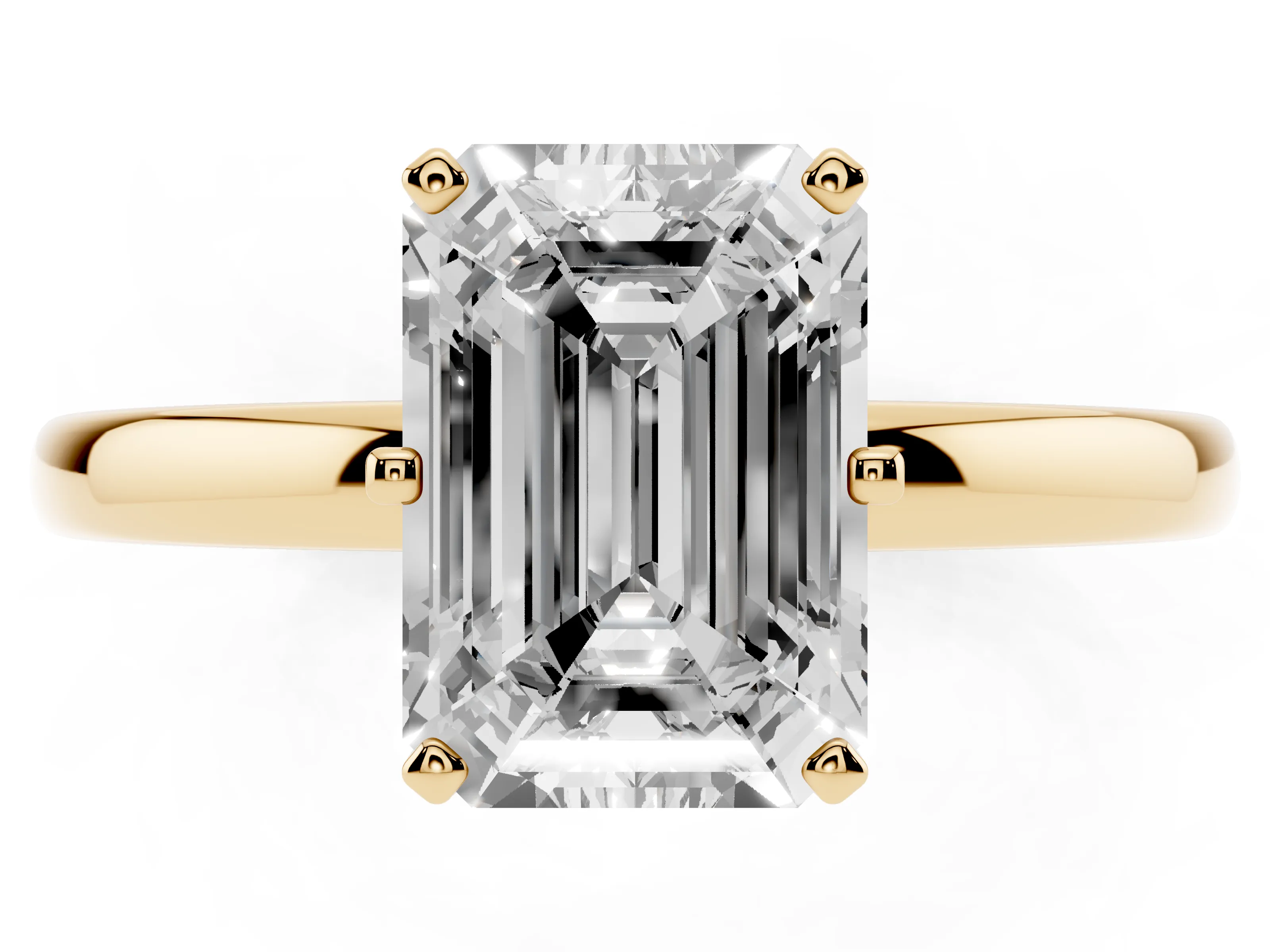 Emerald Cut Diamond Solitaire Ring Set in Yellow gold with Raised Prong Setting on a Classic Band