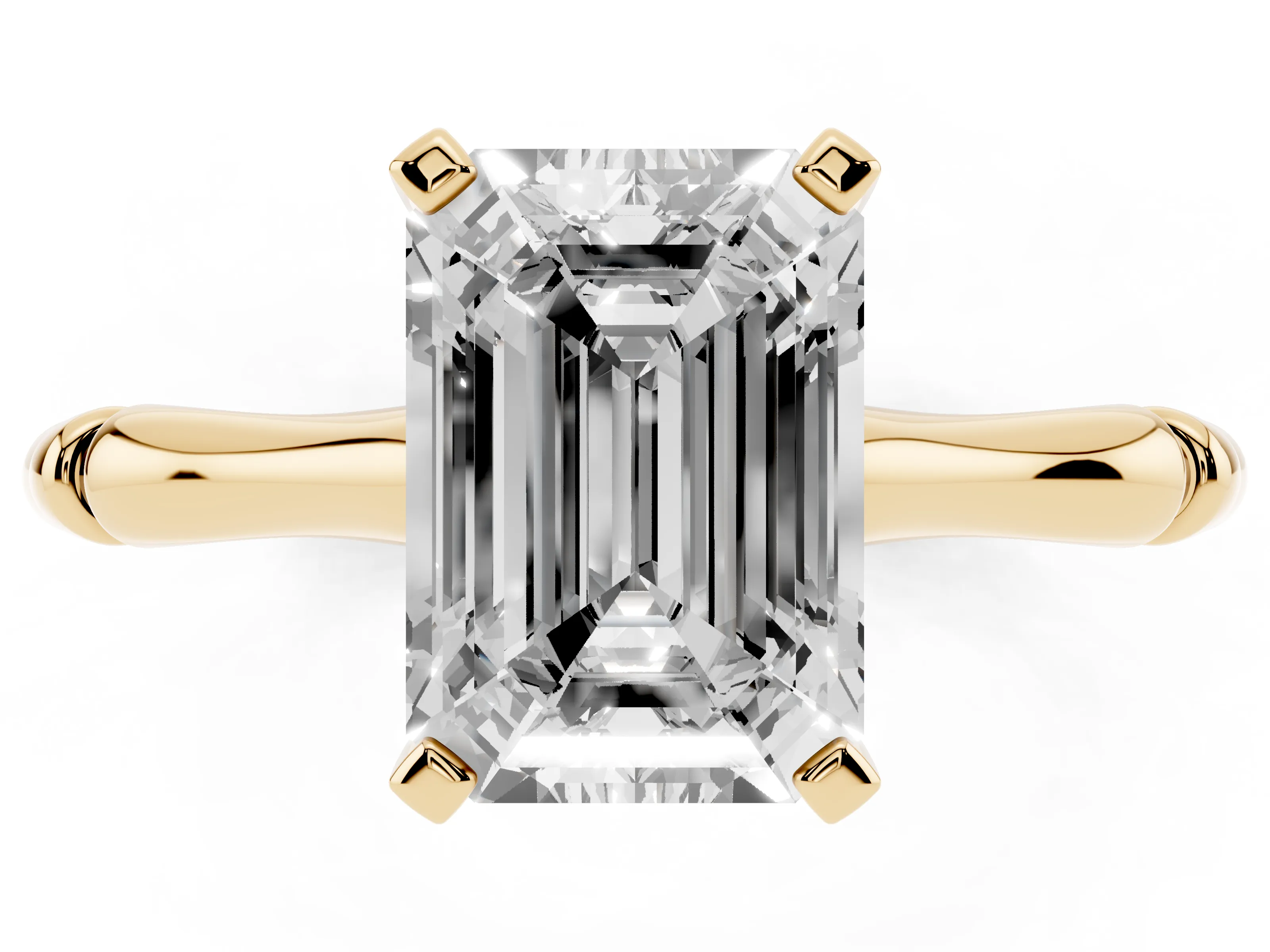 Emerald Cut Diamond Solitaire Ring Set in Yellow gold with Bamboo Band and Prong Setting