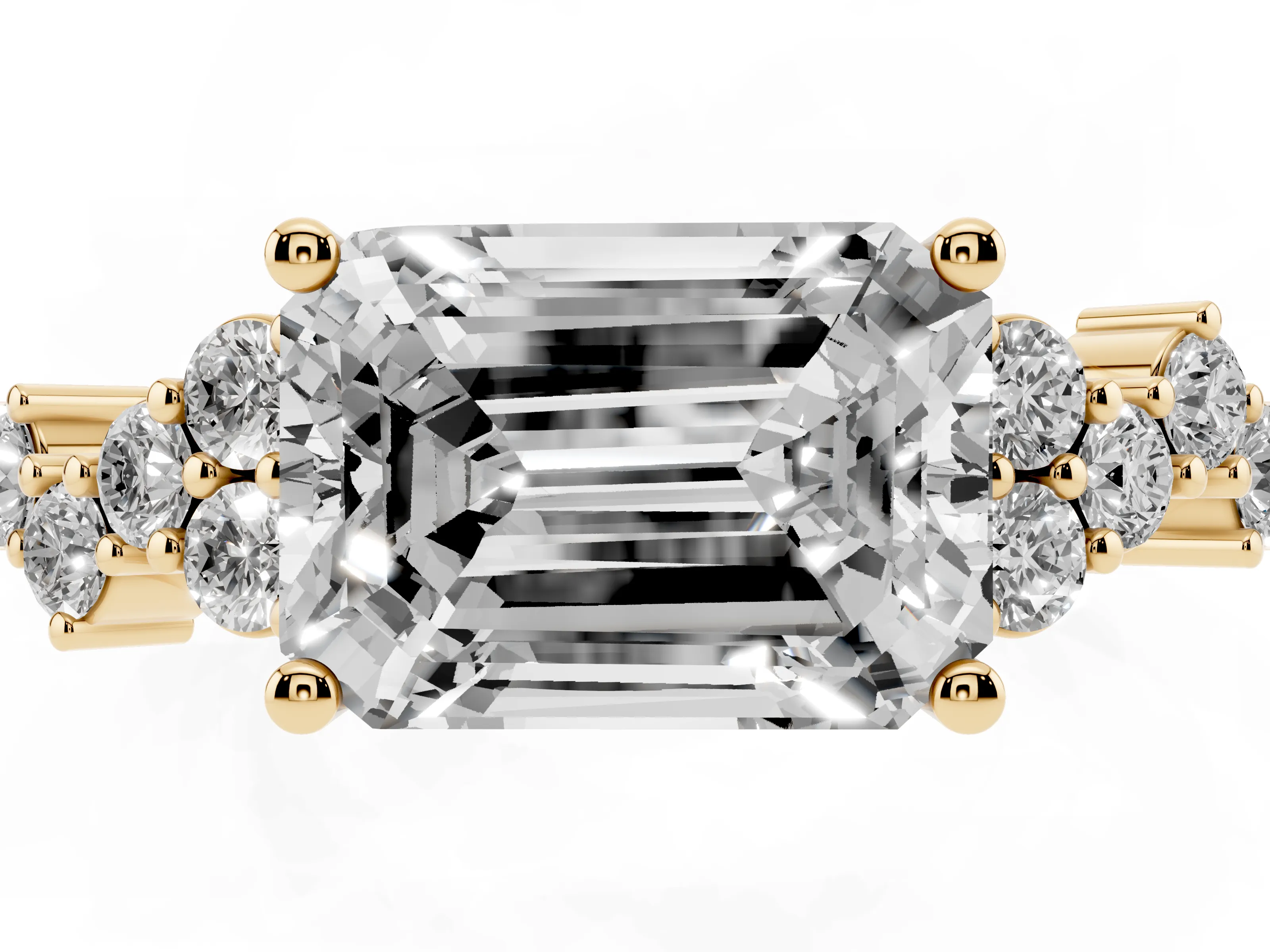Emerald Cut Diamond Ring Set in Yellow gold with Scattered Round Accents