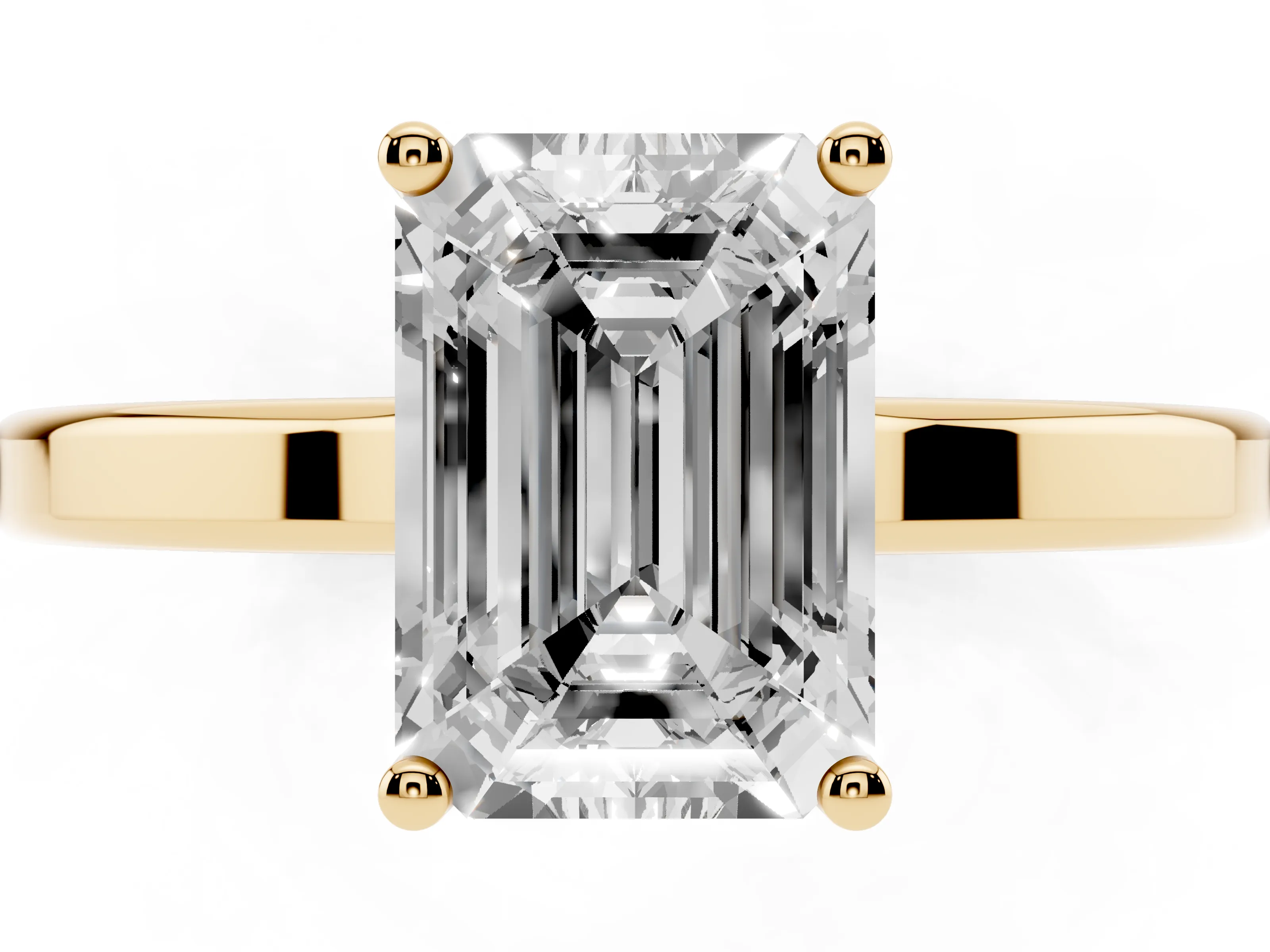 Emerald Cut Diamond Solitaire Engagement Ring Set in Yellow gold with Prong Setting on a Plain Band