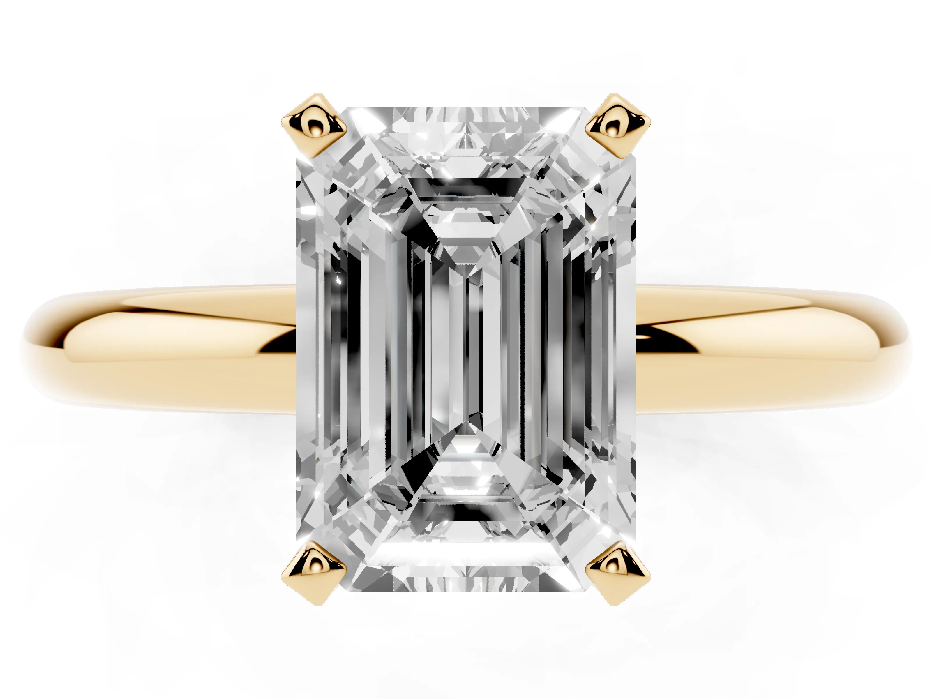 Emerald Cut Diamond Solitaire Engagement Ring Set in Yellow gold with Round Band and Prong Setting