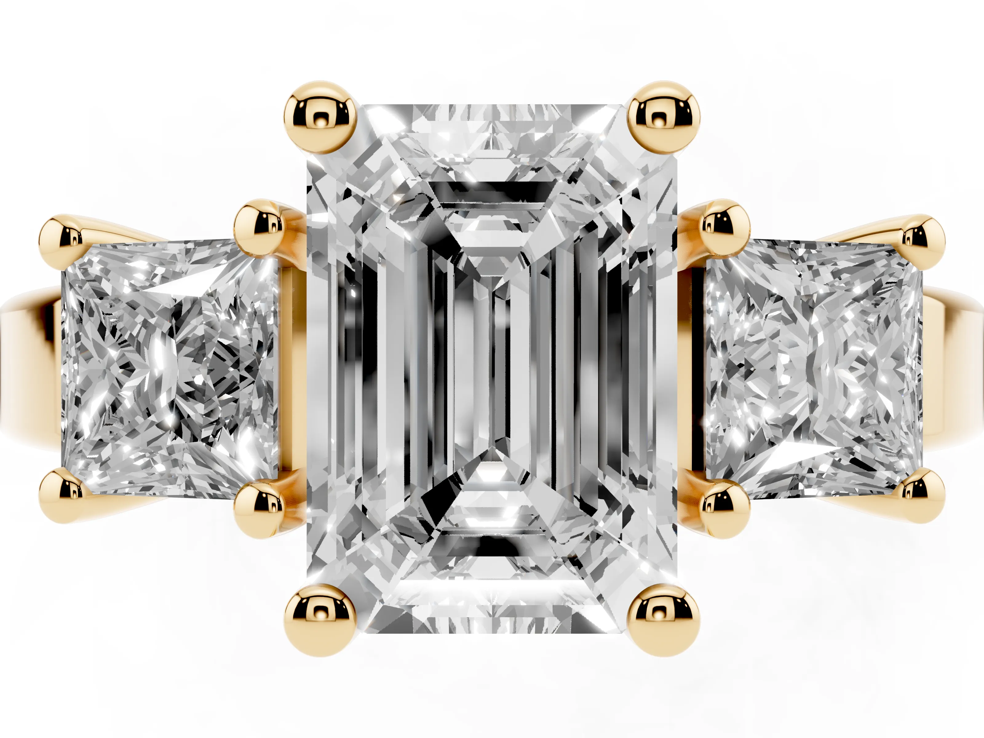 Three-Stone Emerald Cut Diamond Solitaire Ring Set in Yellow gold with Prong Setting