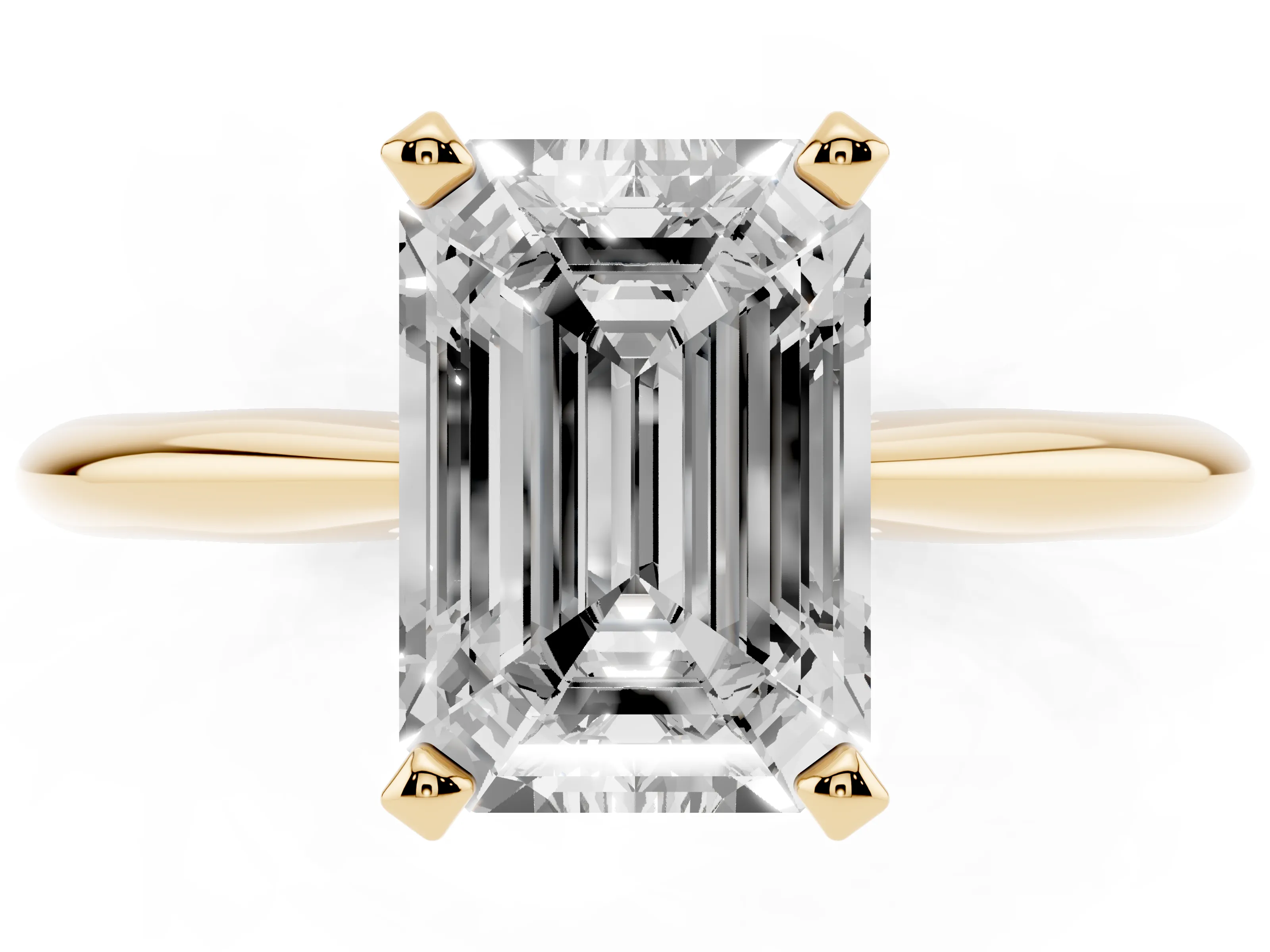 Emerald Cut Diamond Solitaire Ring Set in Yellow gold with Prong Setting on a Plain Round Band