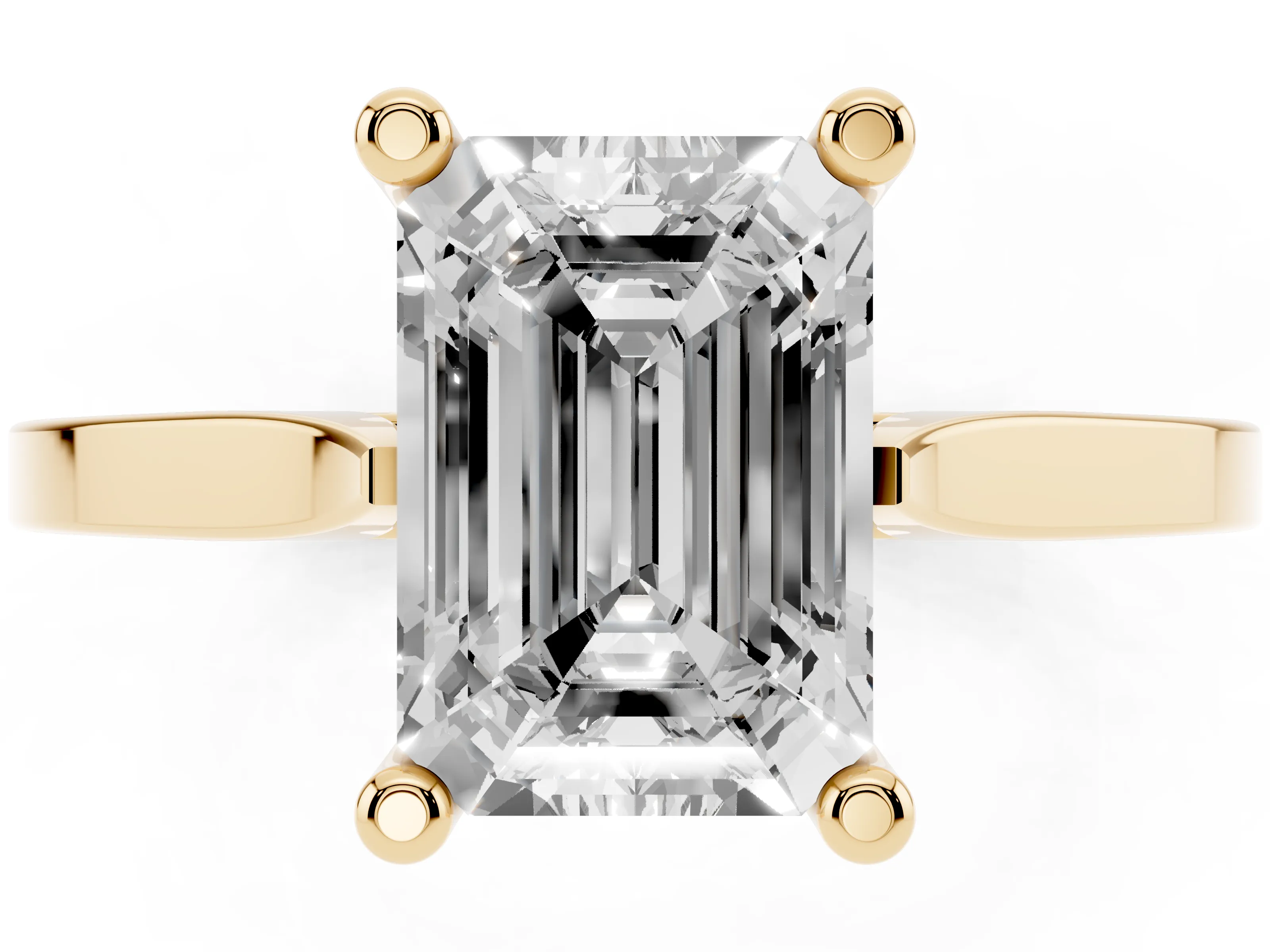 Emerald Cut Diamond Solitaire Ring Set in Yellow gold with Prong Setting and Tapered Band
