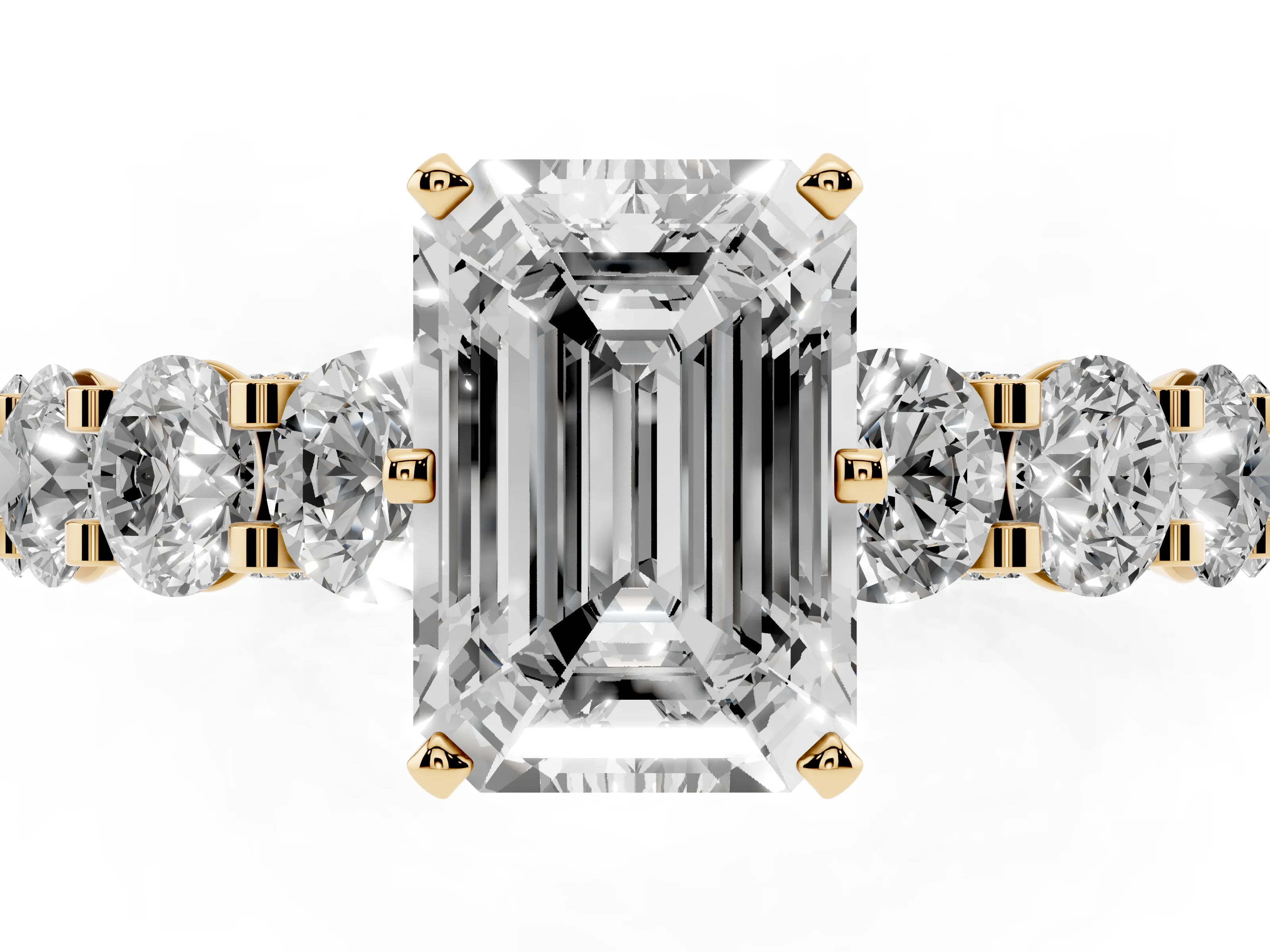 Emerald Cut Diamond Side Stone Ring Set in Yellow gold with Alternating Round and Oval Side Stones