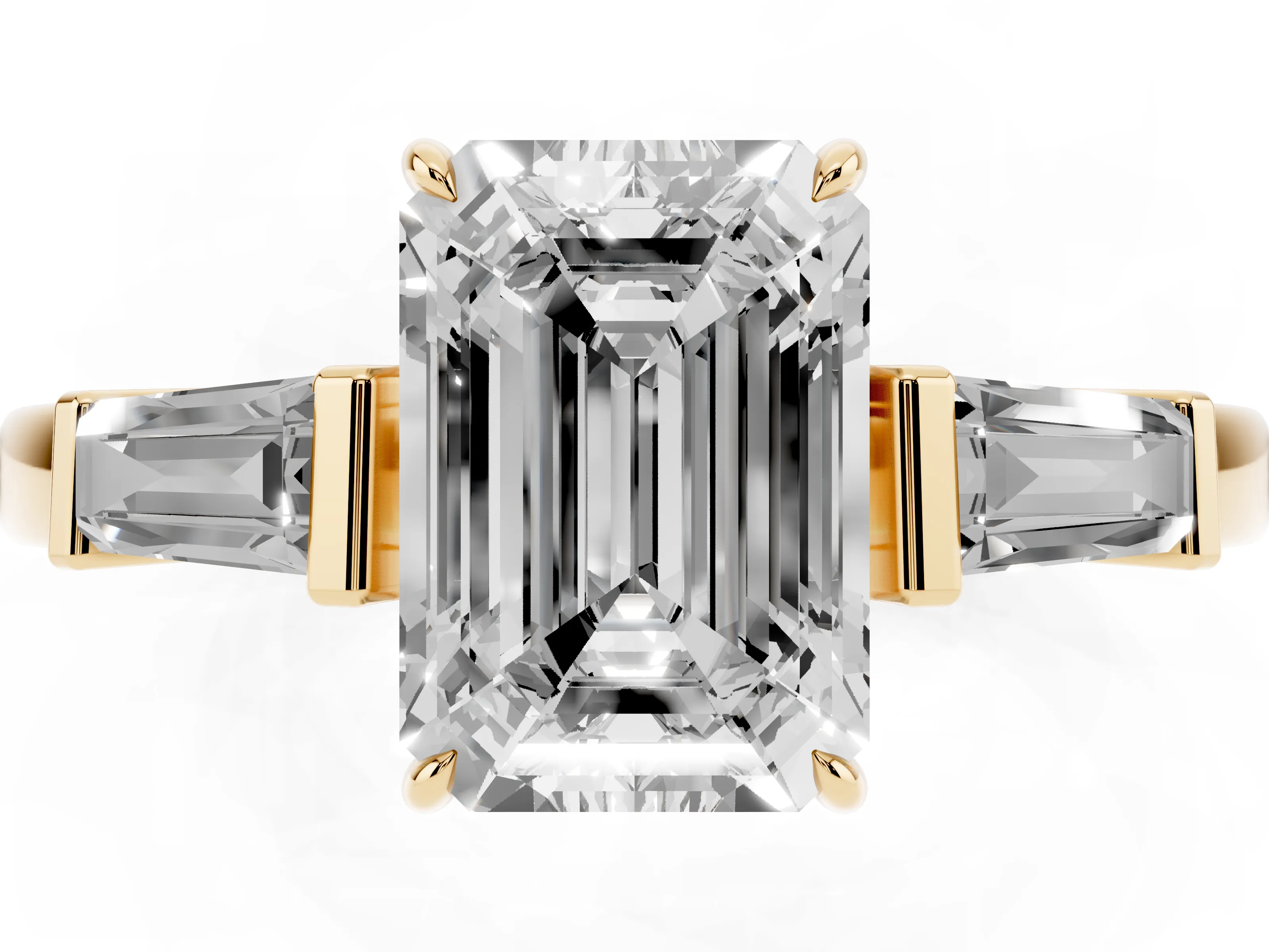 Emerald Cut Diamond Three-Stone Ring Set in Yellow gold with Tapered Baguette Side Stones and Prong Setting