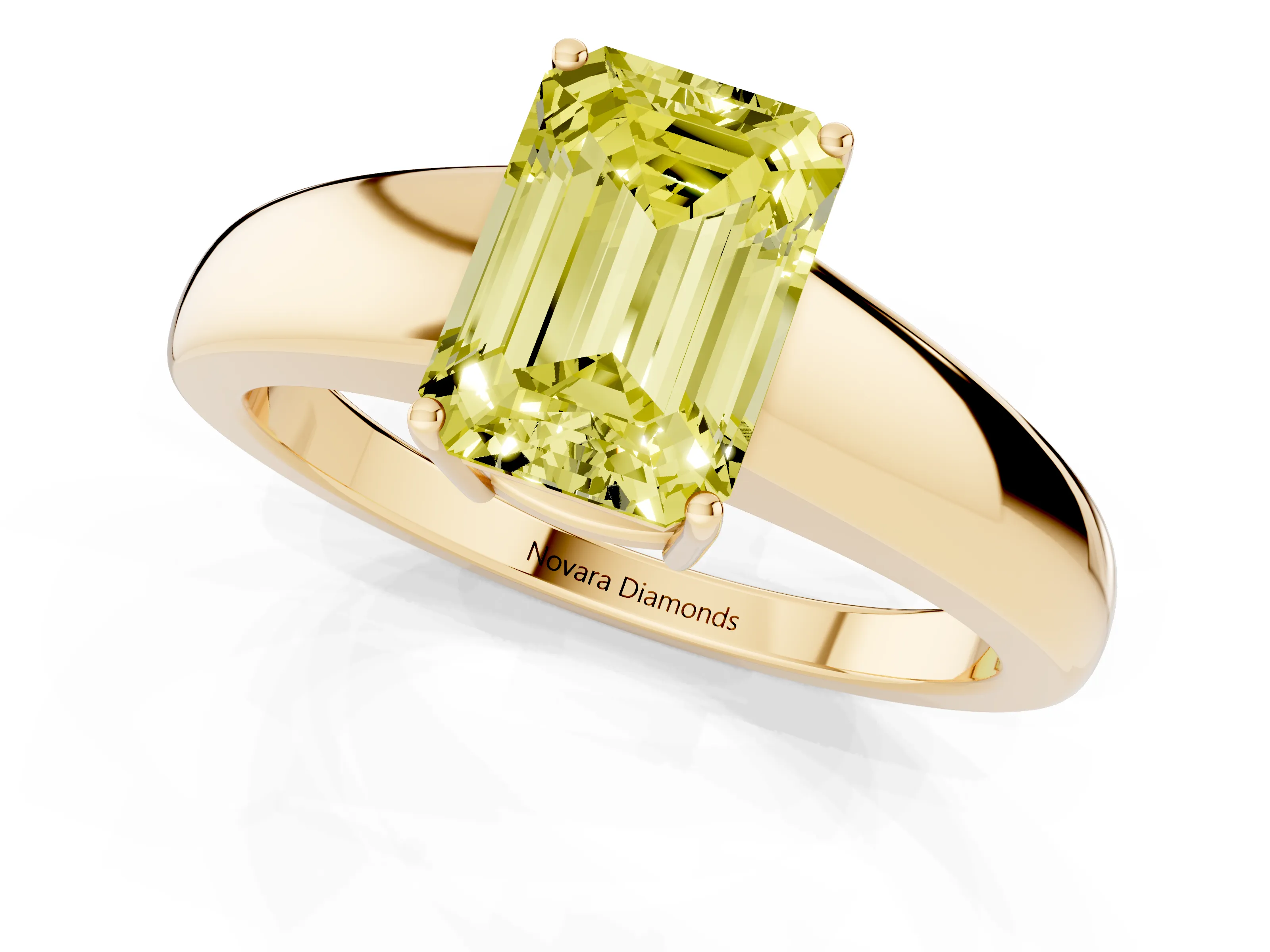 Fancy Yellow Emerald Cut Diamond Solitaire Ring Set in Yellow gold with Tapered Band and Prong Setting