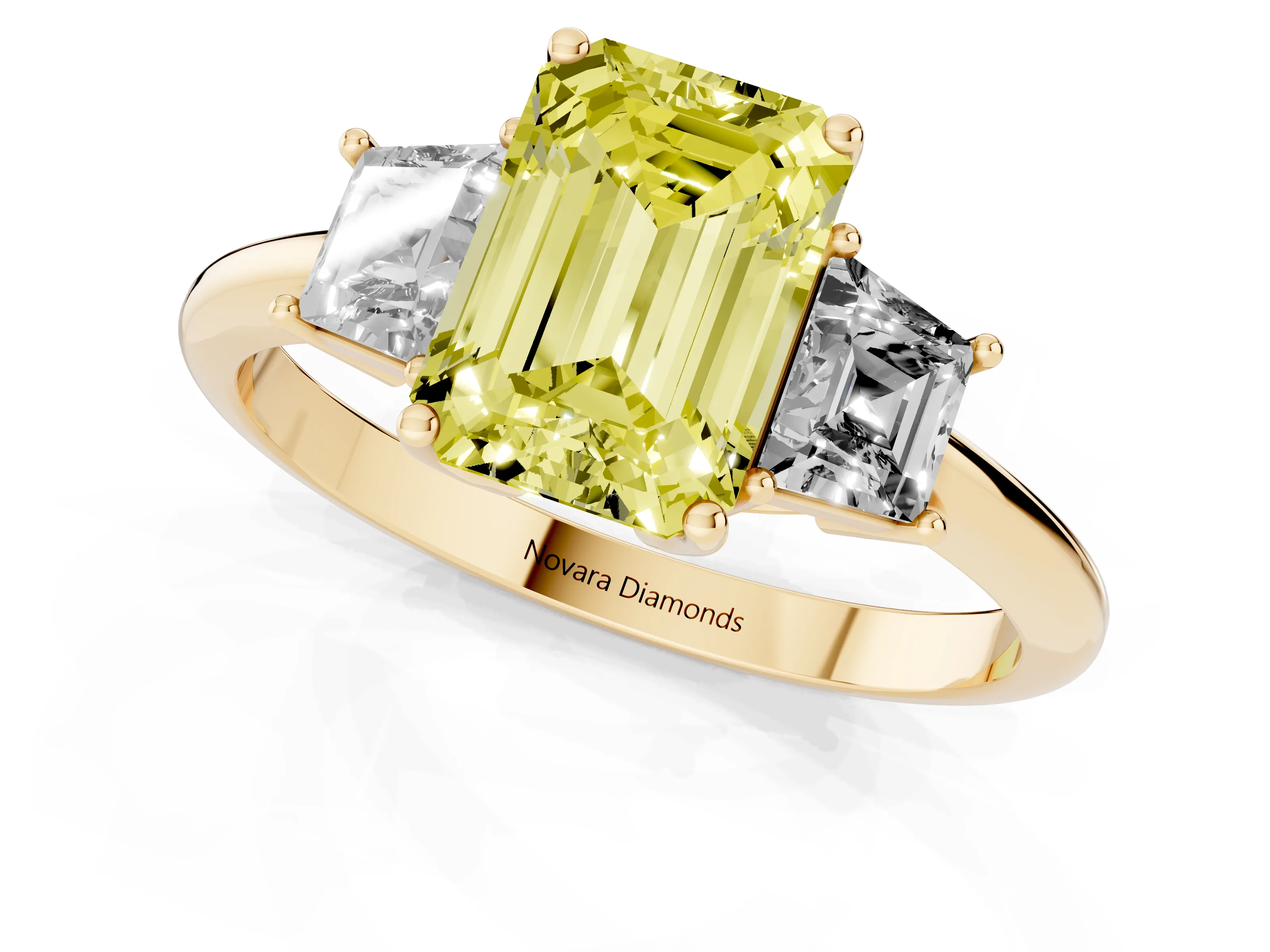 Fancy Yellow Emerald Cut Diamond Three-Stone Ring Set in Yellow gold with Trapezoid Side Stones and Prong Setting
