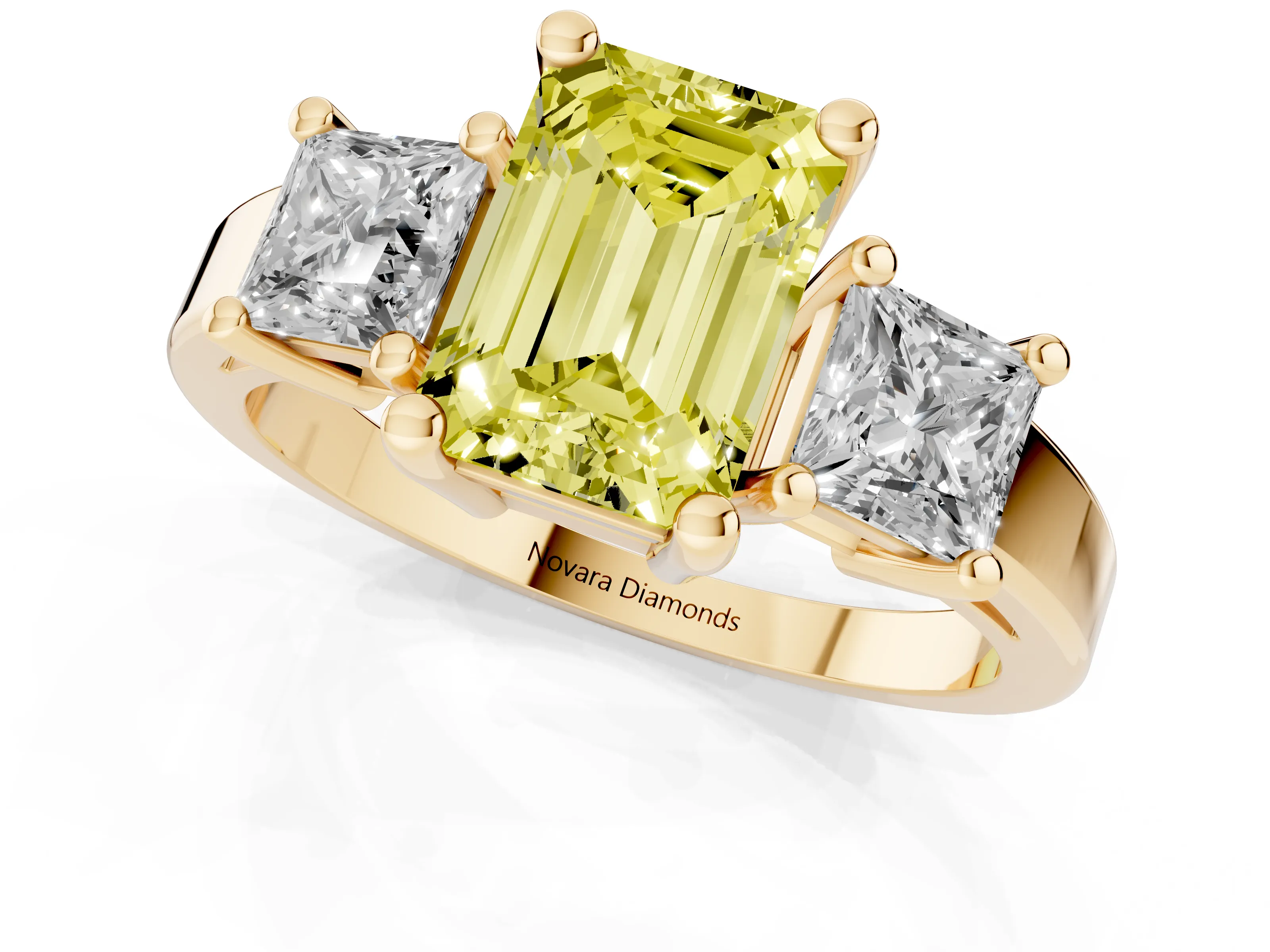 Fancy Yellow Three-Stone Emerald Cut Diamond Solitaire Ring Set in Yellow gold with Prong Setting