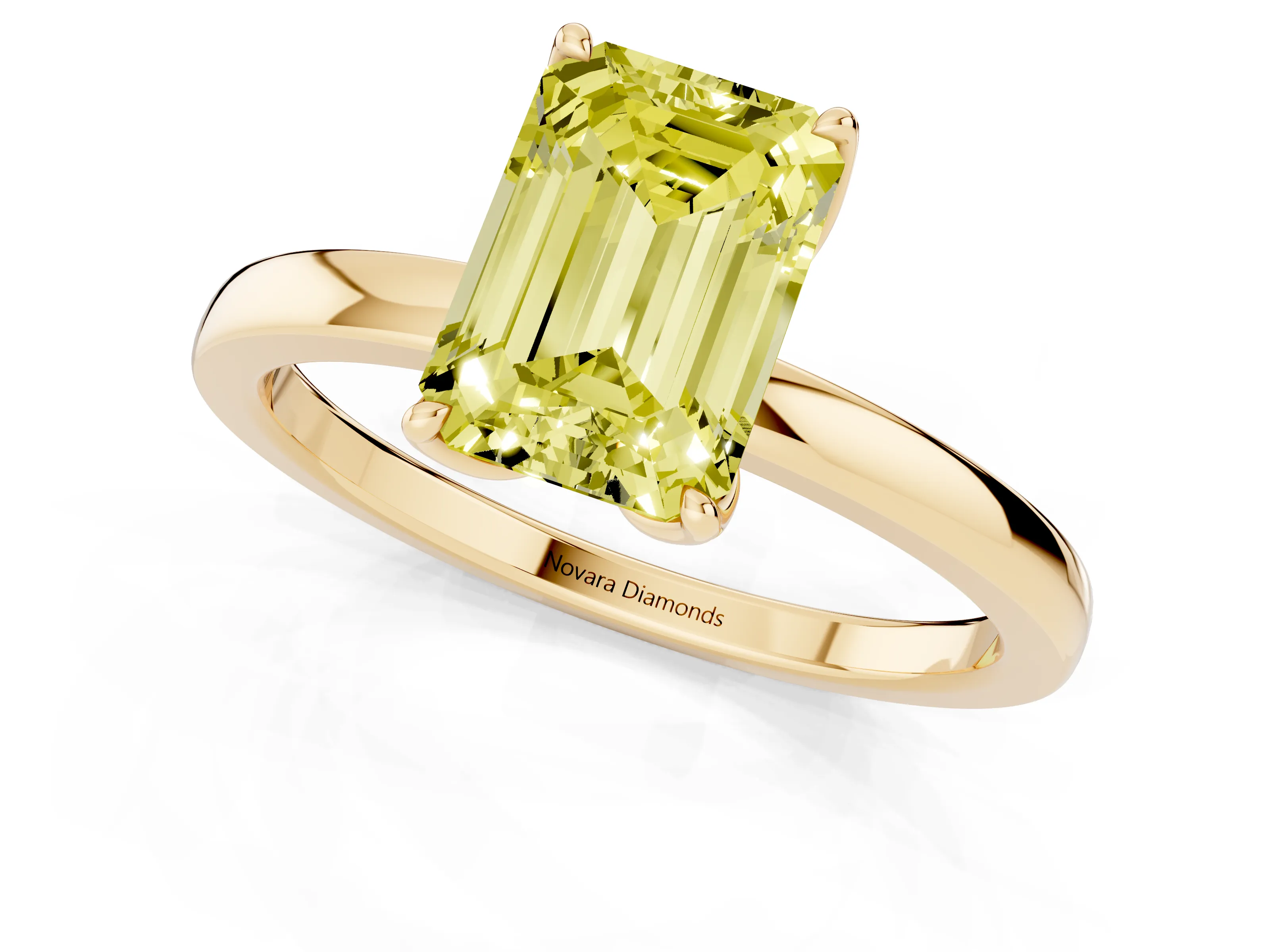 Fancy Yellow Emerald Cut Diamond Solitaire Ring Set in Yellow gold with Prong Setting and Thin Polished Band