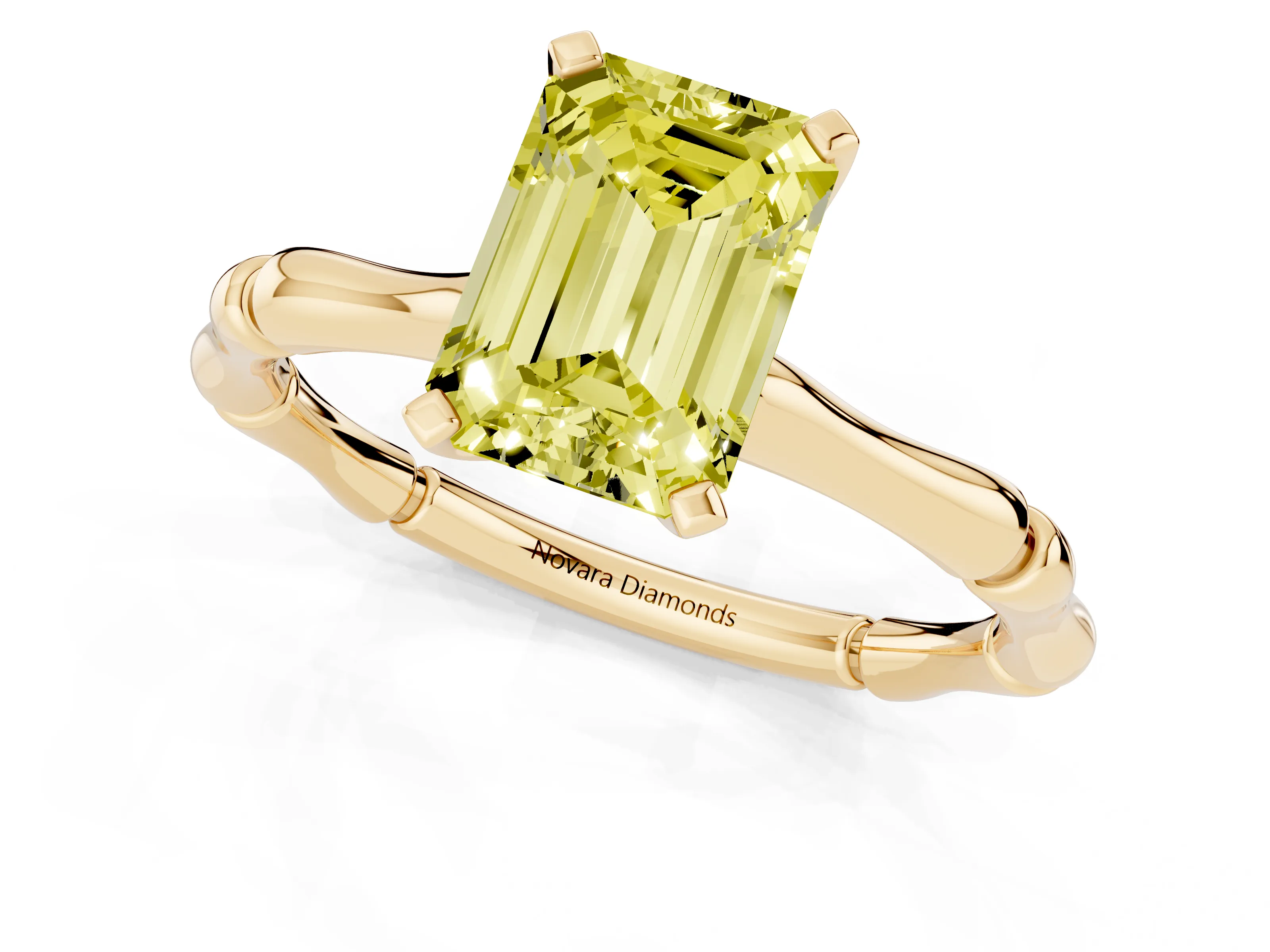 Fancy Yellow Emerald Cut Diamond Solitaire Ring Set in Yellow gold with Bamboo Band and Prong Setting