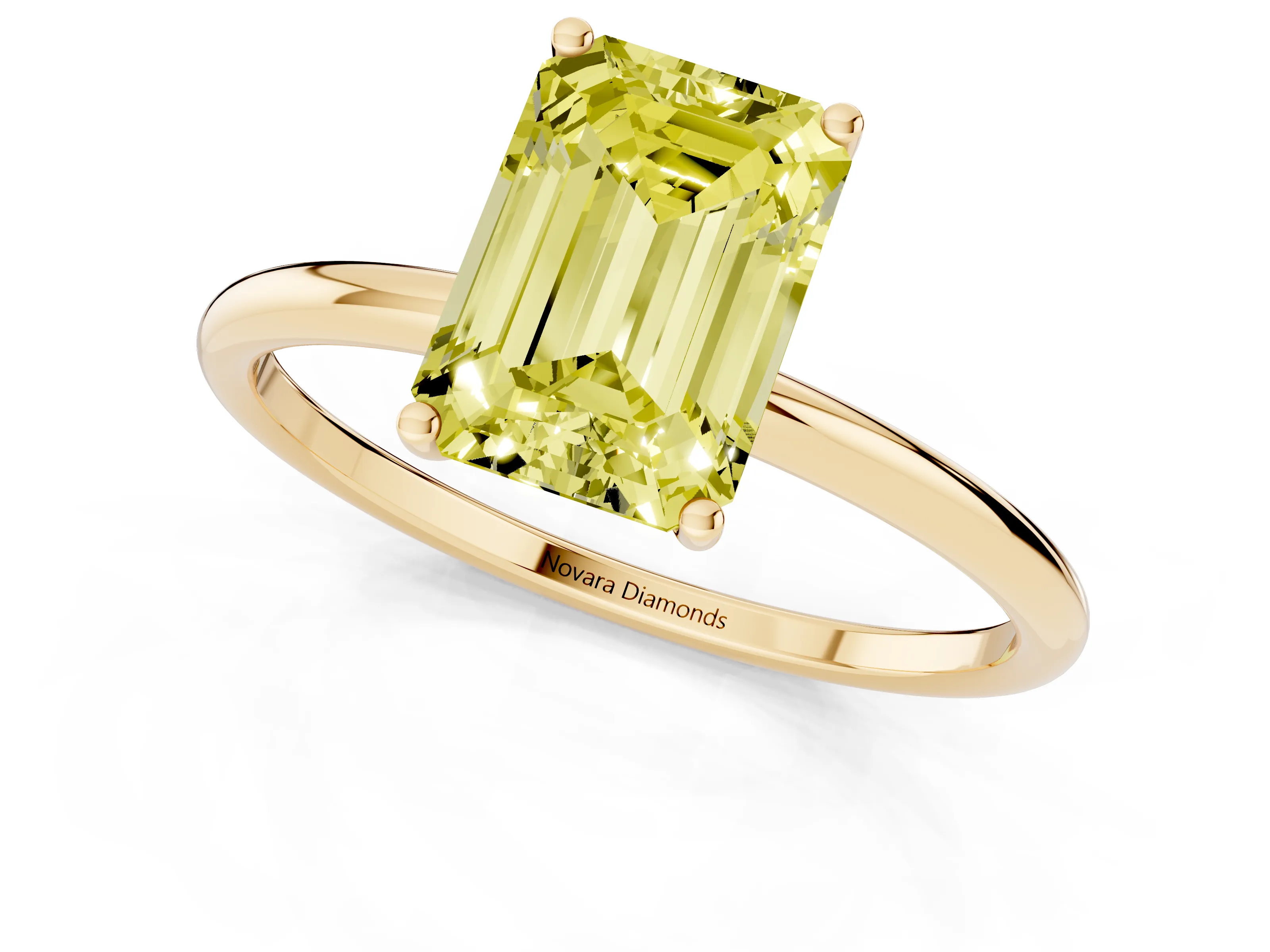 Fancy Yellow Emerald Cut Diamond Solitaire Engagement Ring Set in Yellow gold with Thin Band and Prong Setting