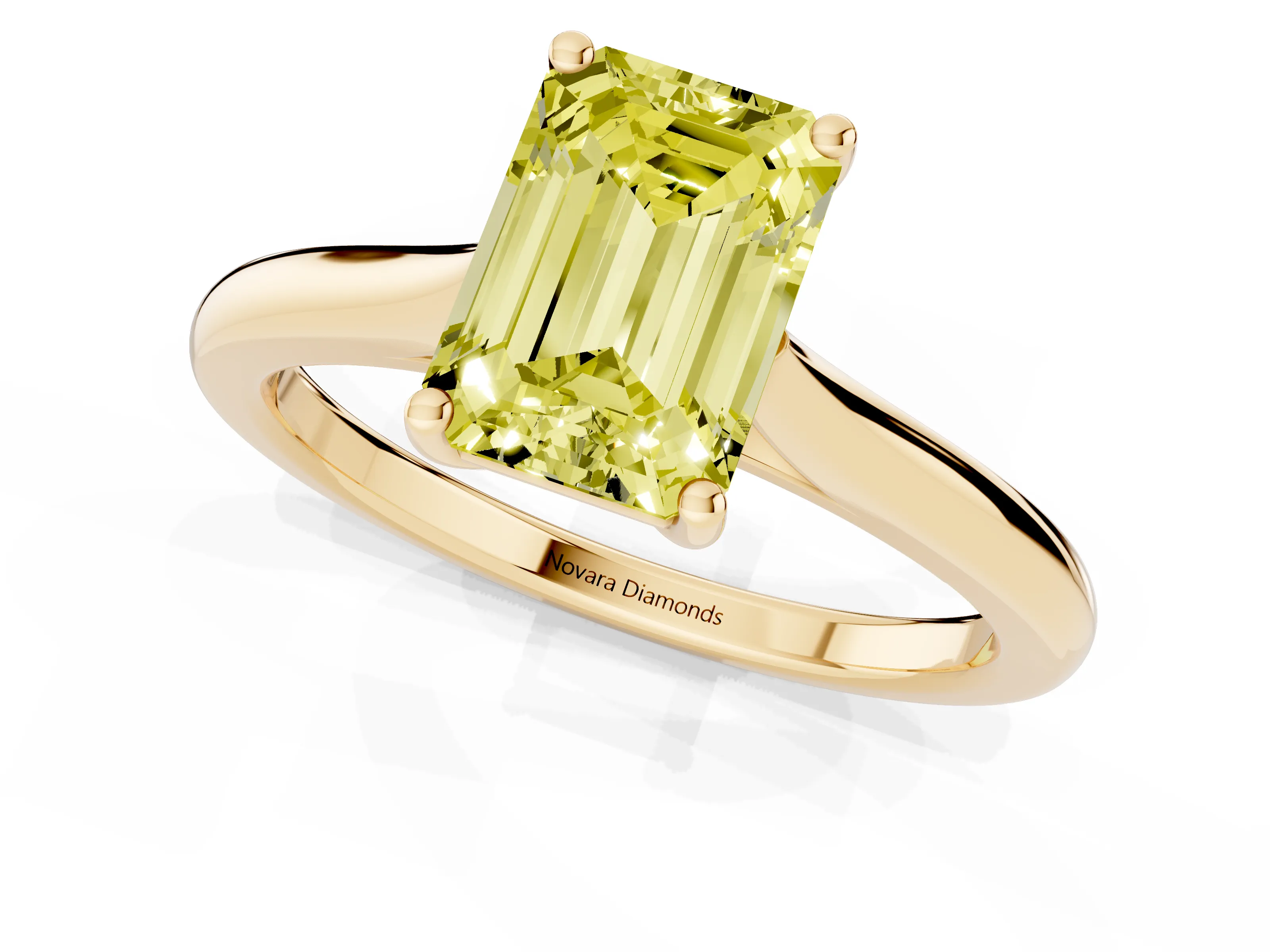Fancy Yellow Emerald Cut Diamond Solitaire Ring Set in Yellow gold with Cathedral Band and Prong Setting