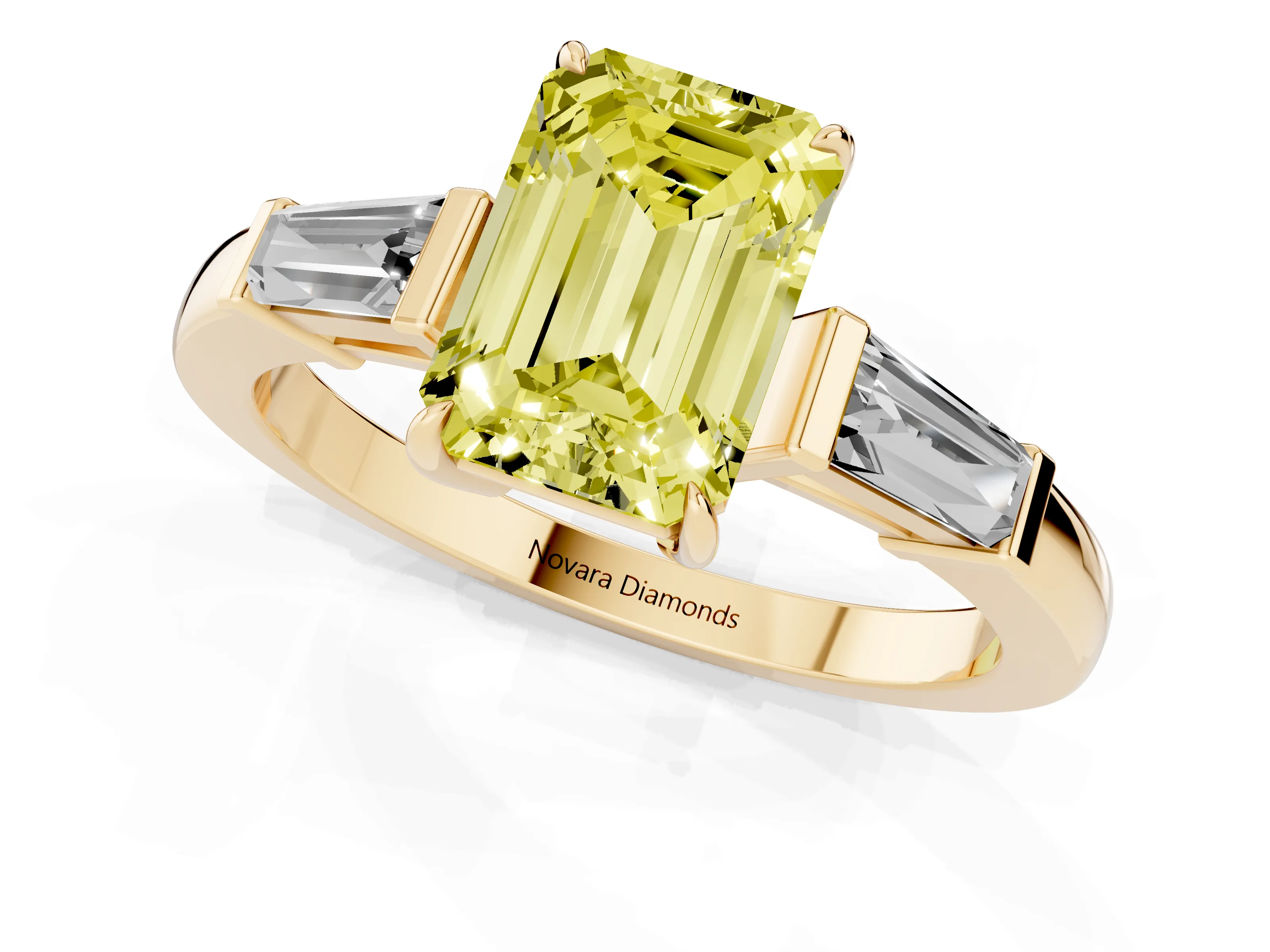 Fancy Yellow Emerald Cut Diamond Three-Stone Ring Set in Yellow gold with Tapered Baguette Side Stones and Prong Setting