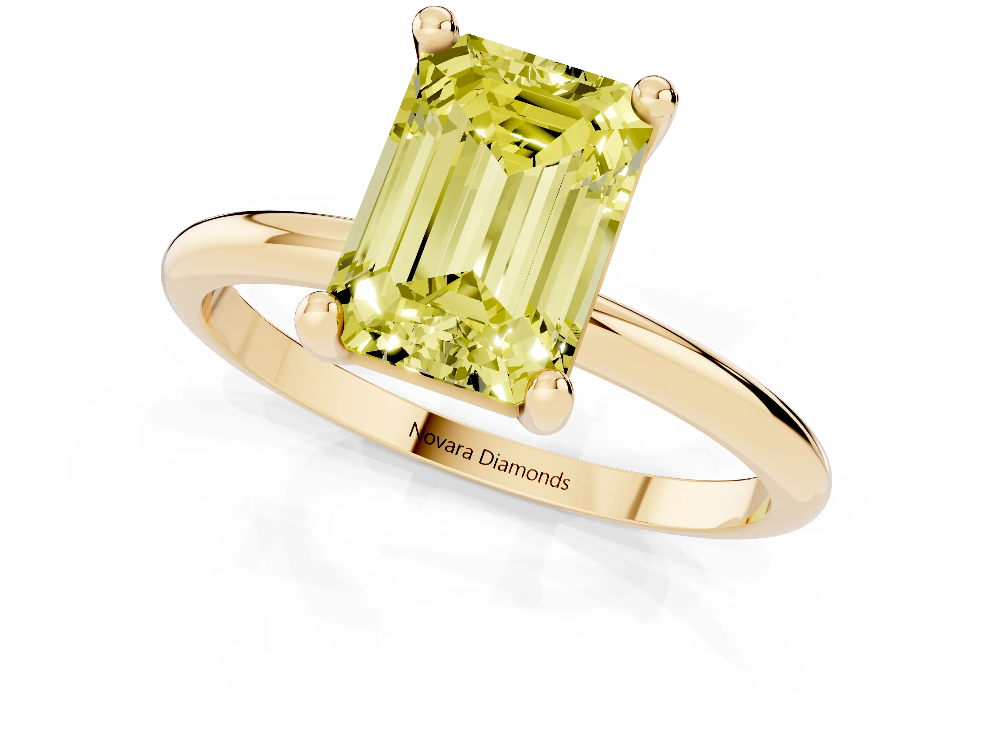 Fancy Yellow Emerald Cut Diamond Solitaire Ring Set in Yellow gold with Secure Prong Setting on a Classic Band